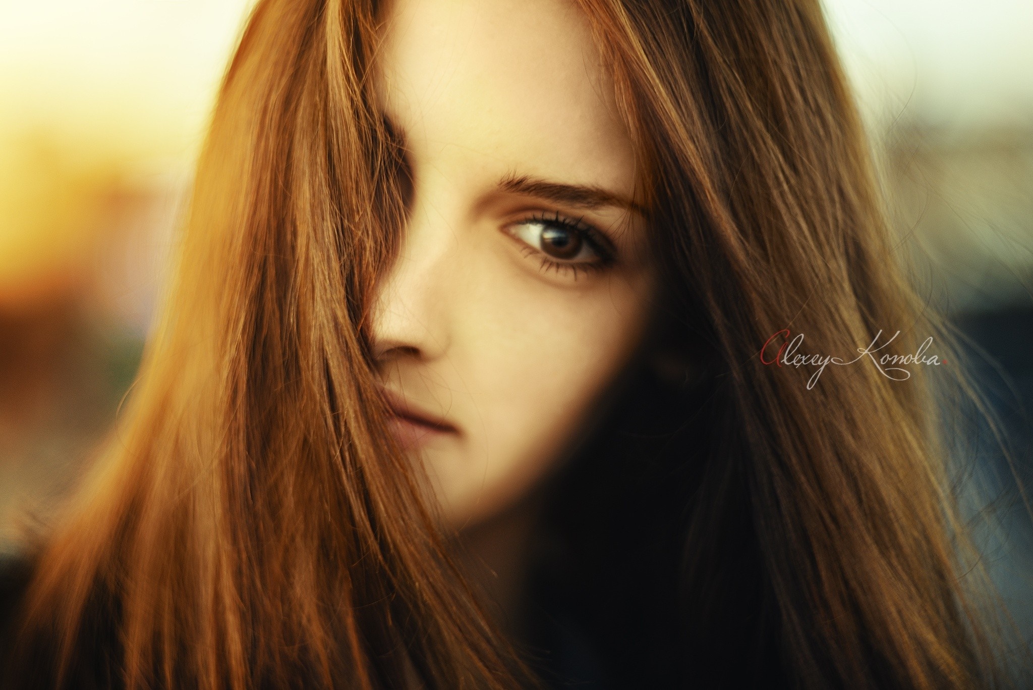 Portrait of a young woman with long brown hair HD Wallpaper