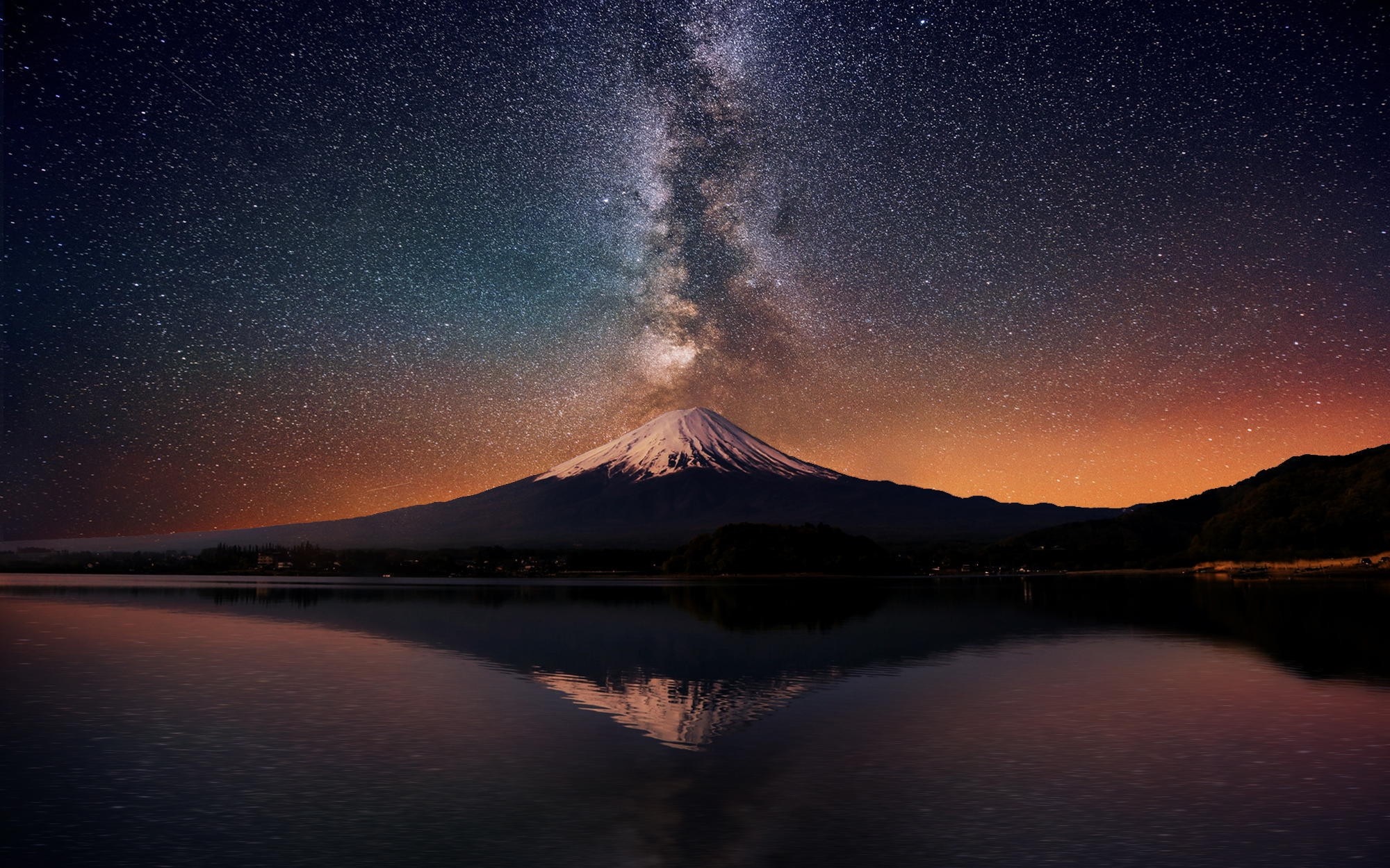 Mount Fuji under the Milky Way reflected in a lake HD Wallpaper