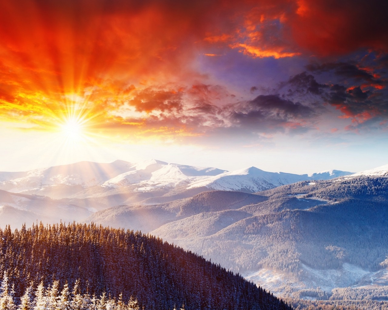 Sunrise over snow-covered mountains and forest HD Wallpaper