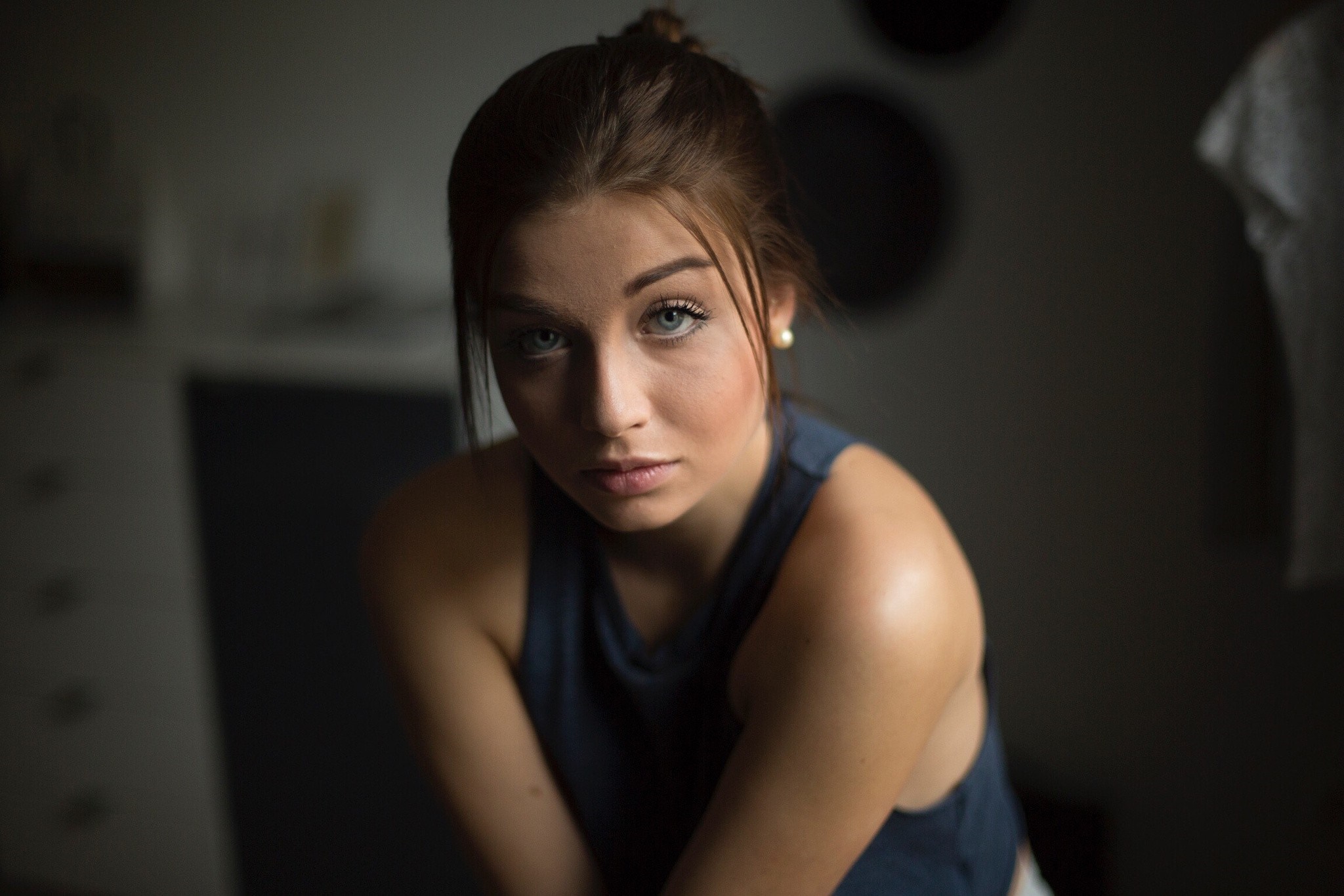 Woman with brown hair in a dark tank top HD Wallpaper