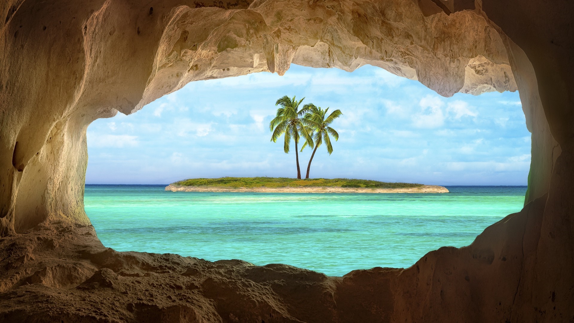 View of a tropical island from a cave HD Wallpaper