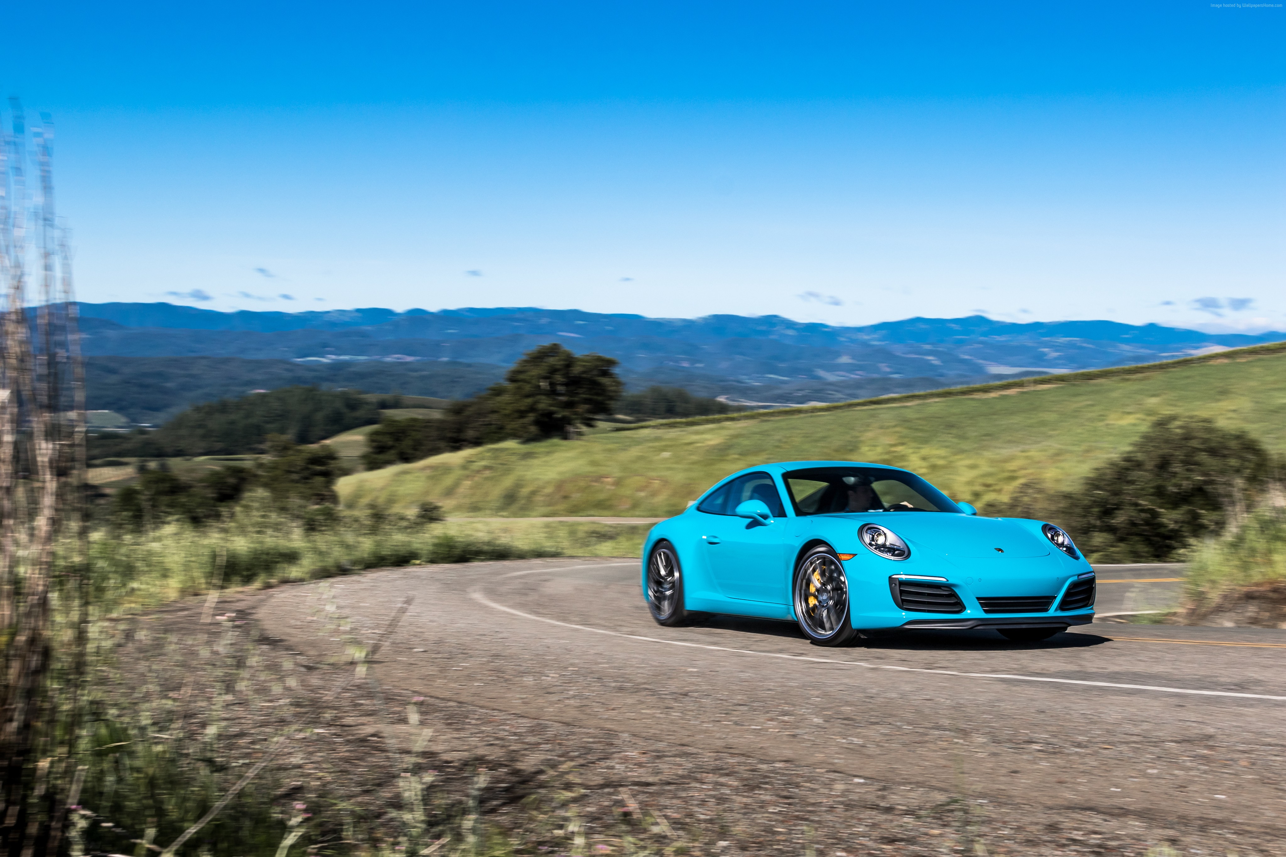 Blue Porsche 911 Carrera 4S Coupe on a winding road HD Wallpaper