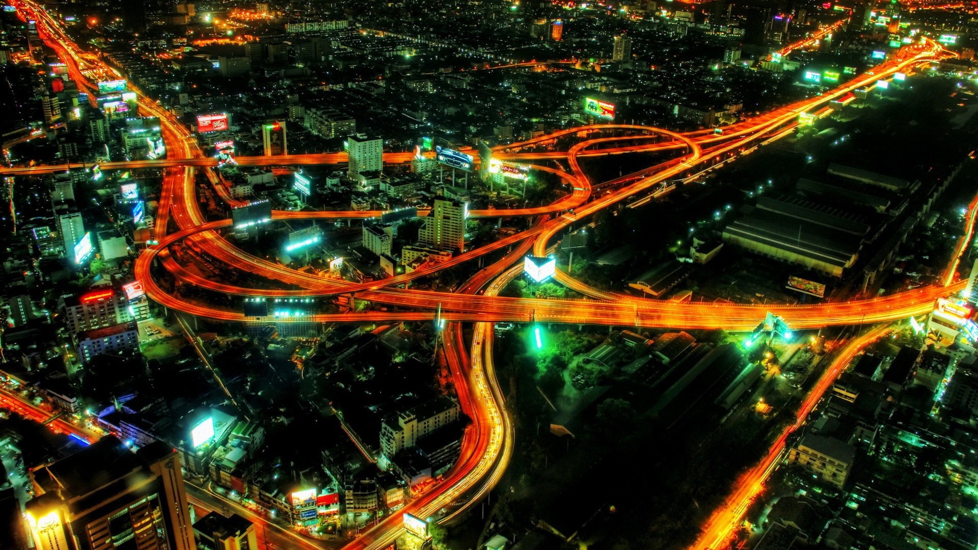 Bangkok cityscape at night with illuminated highways HD Wallpaper