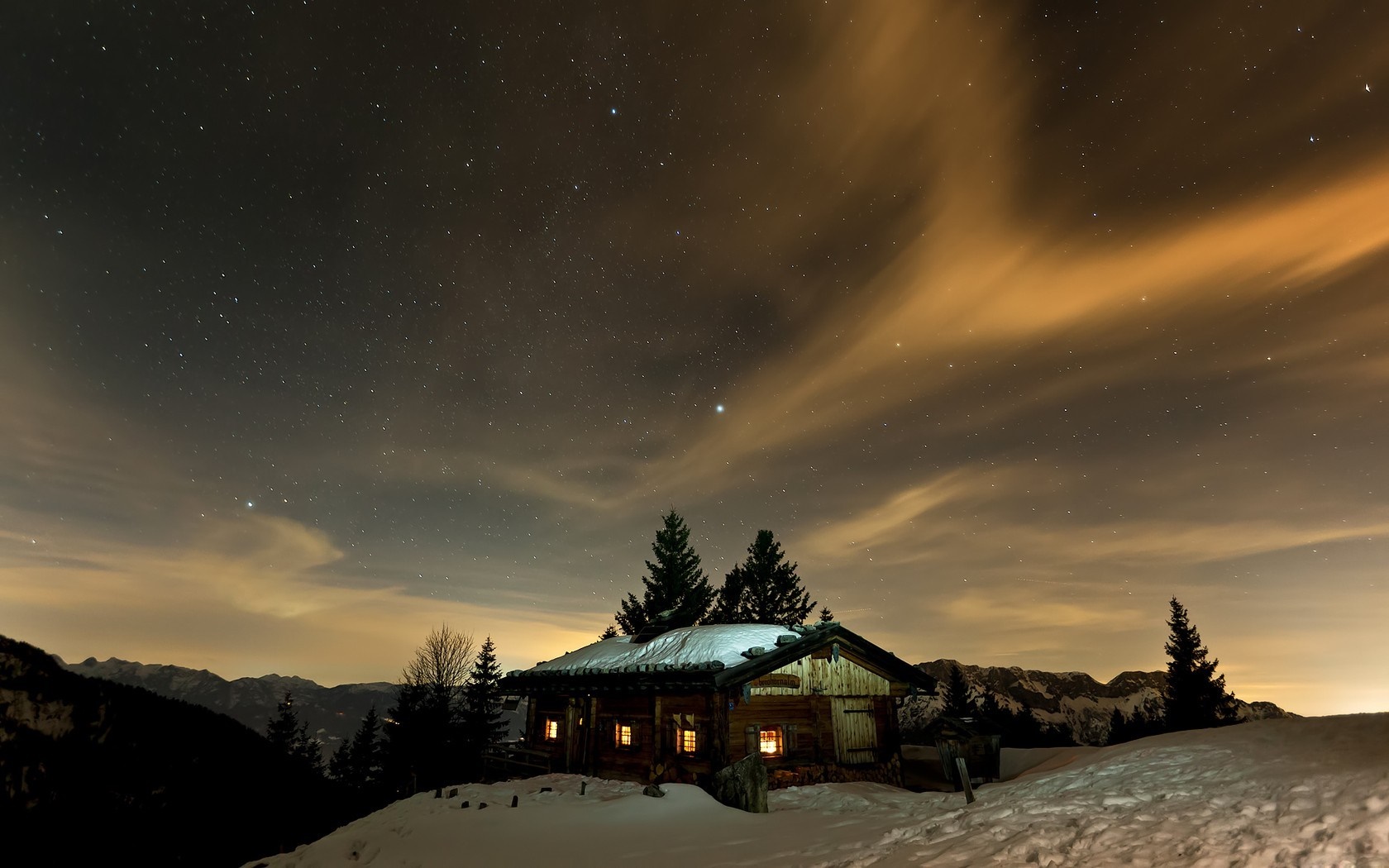 Wooden cabin under starry night sky with clouds HD Wallpaper