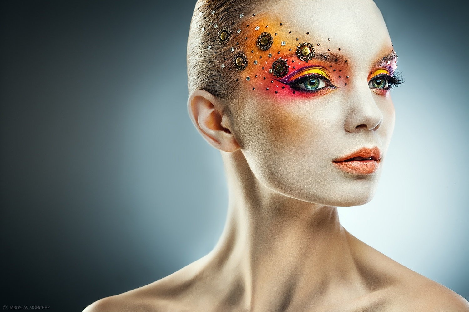 Woman with colorful makeup and face jewels HD Wallpaper