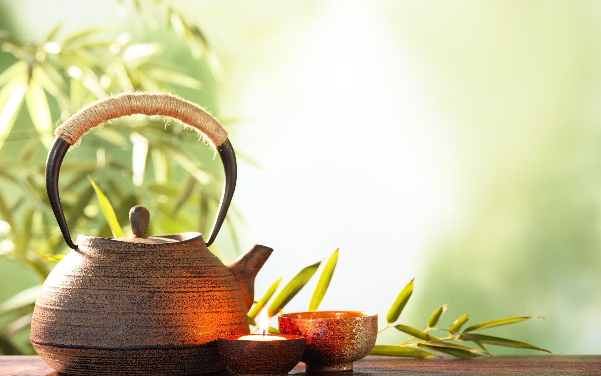 Tea set with bamboo and candle HD Wallpaper