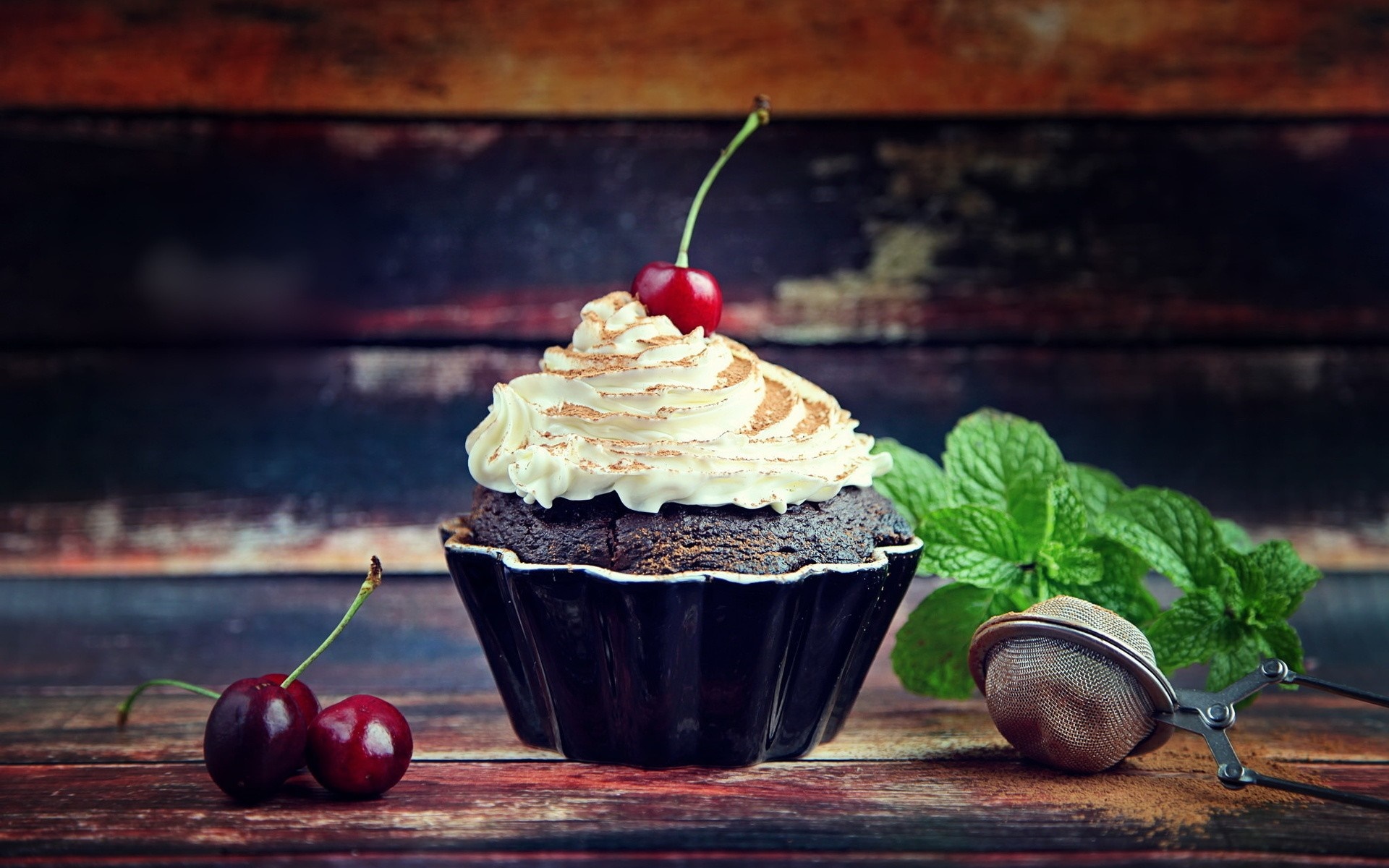 Chocolate cupcake with whipped cream and cherries HD Wallpaper