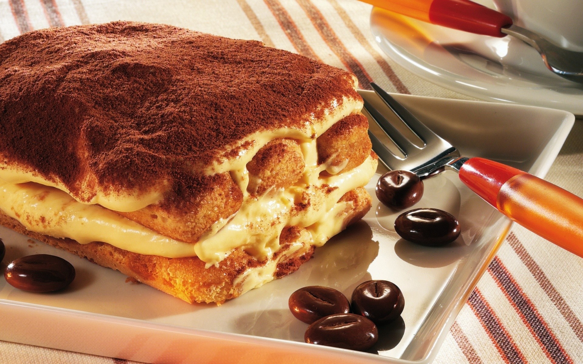 Tiramisu dessert with chocolate coffee beans and fork HD Wallpaper