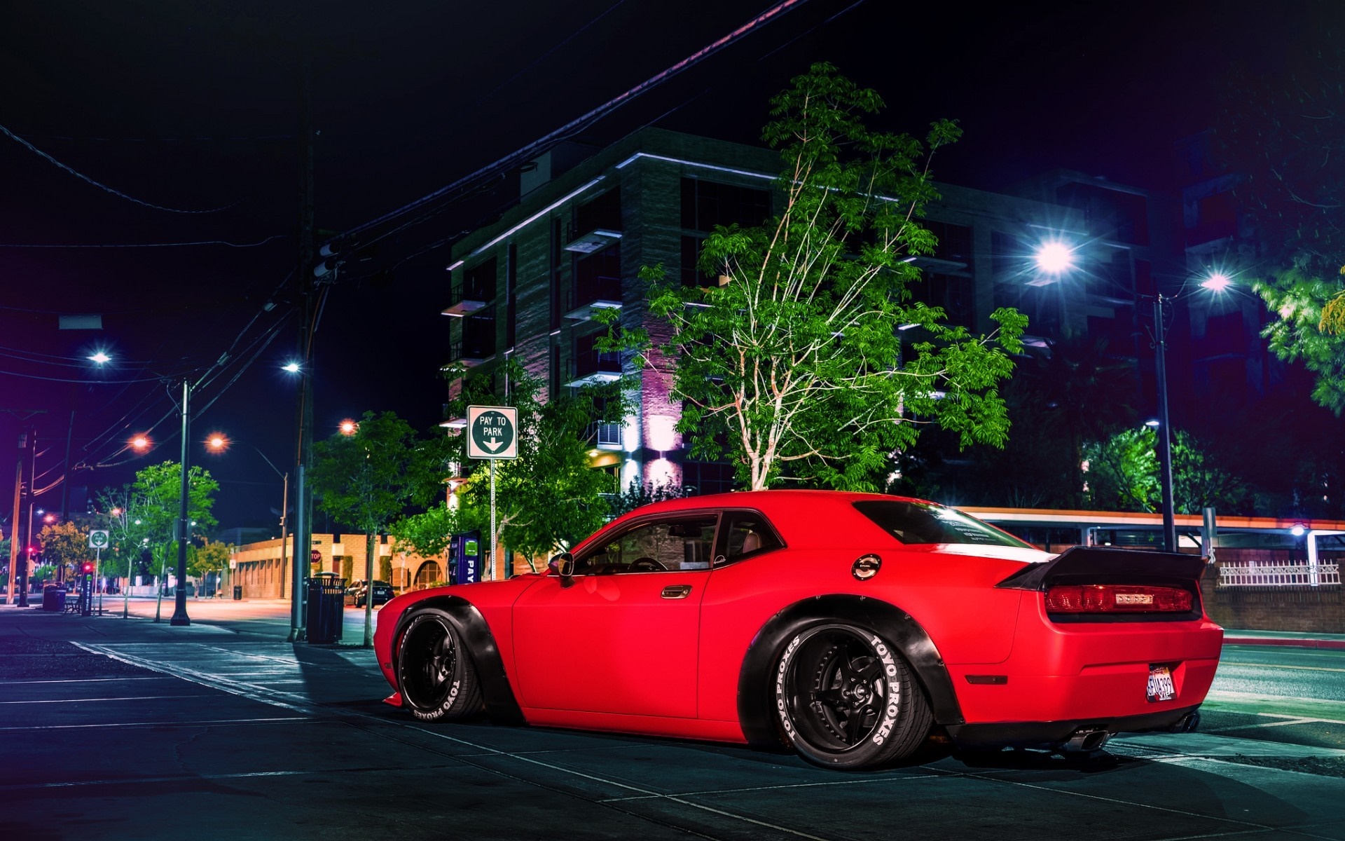 Red Dodge Challenger Widebody parked at night HD Wallpaper