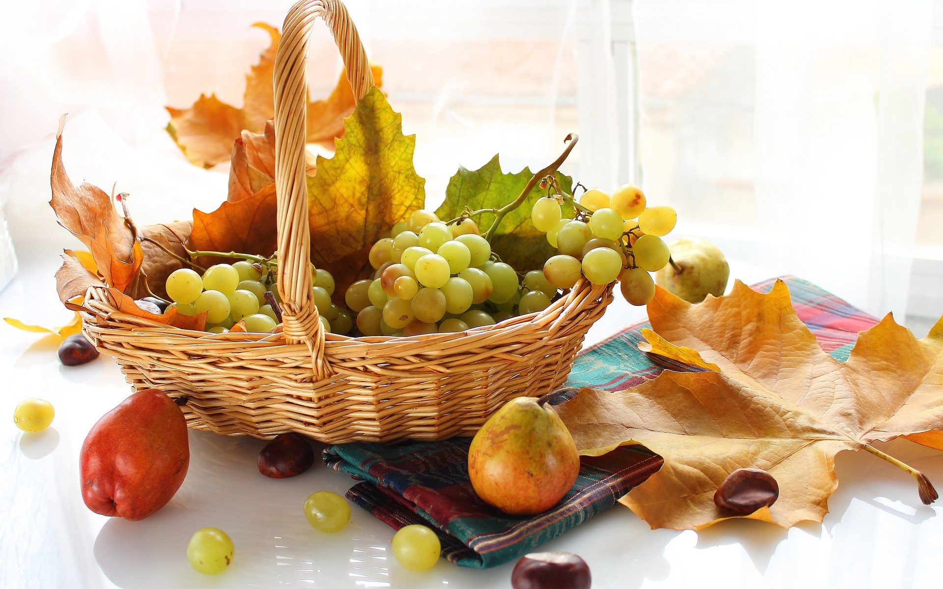 Basket of grapes with pears and autumn leaves HD Wallpaper