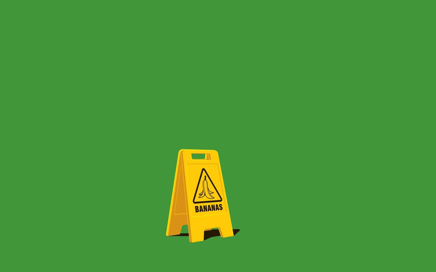 Yellow "Bananas" Warning Sign on Green Background HD Wallpaper