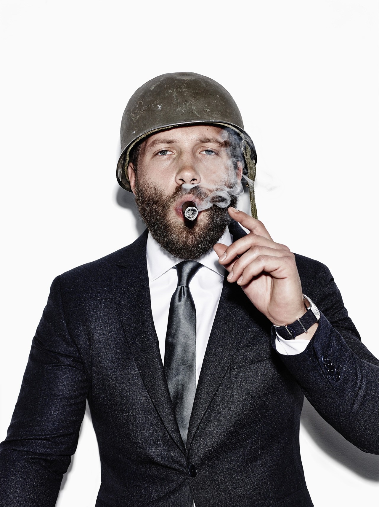 Jai Courtney smoking a cigar wearing a helmet HD Wallpaper