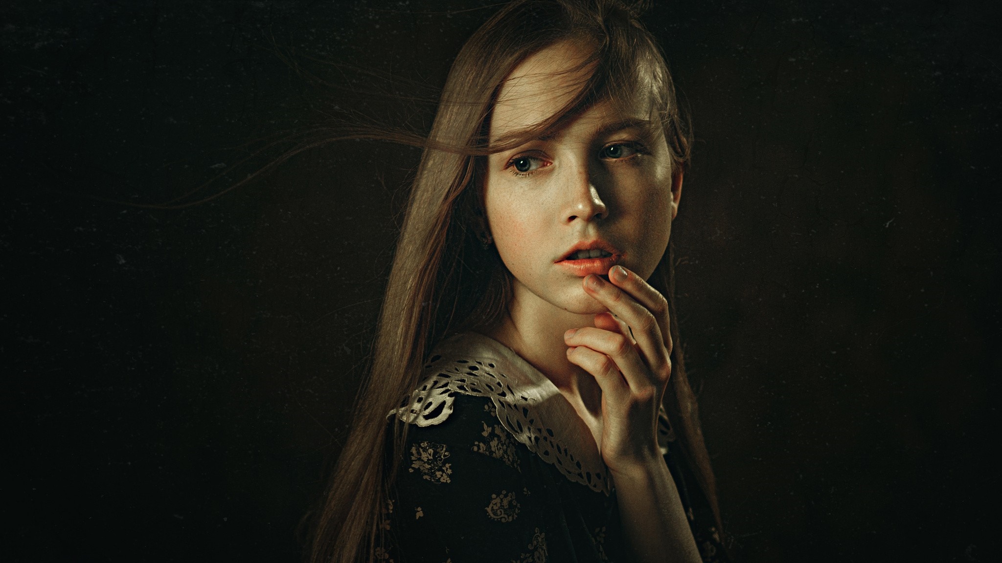 Young woman with long hair in a dark dress HD Wallpaper