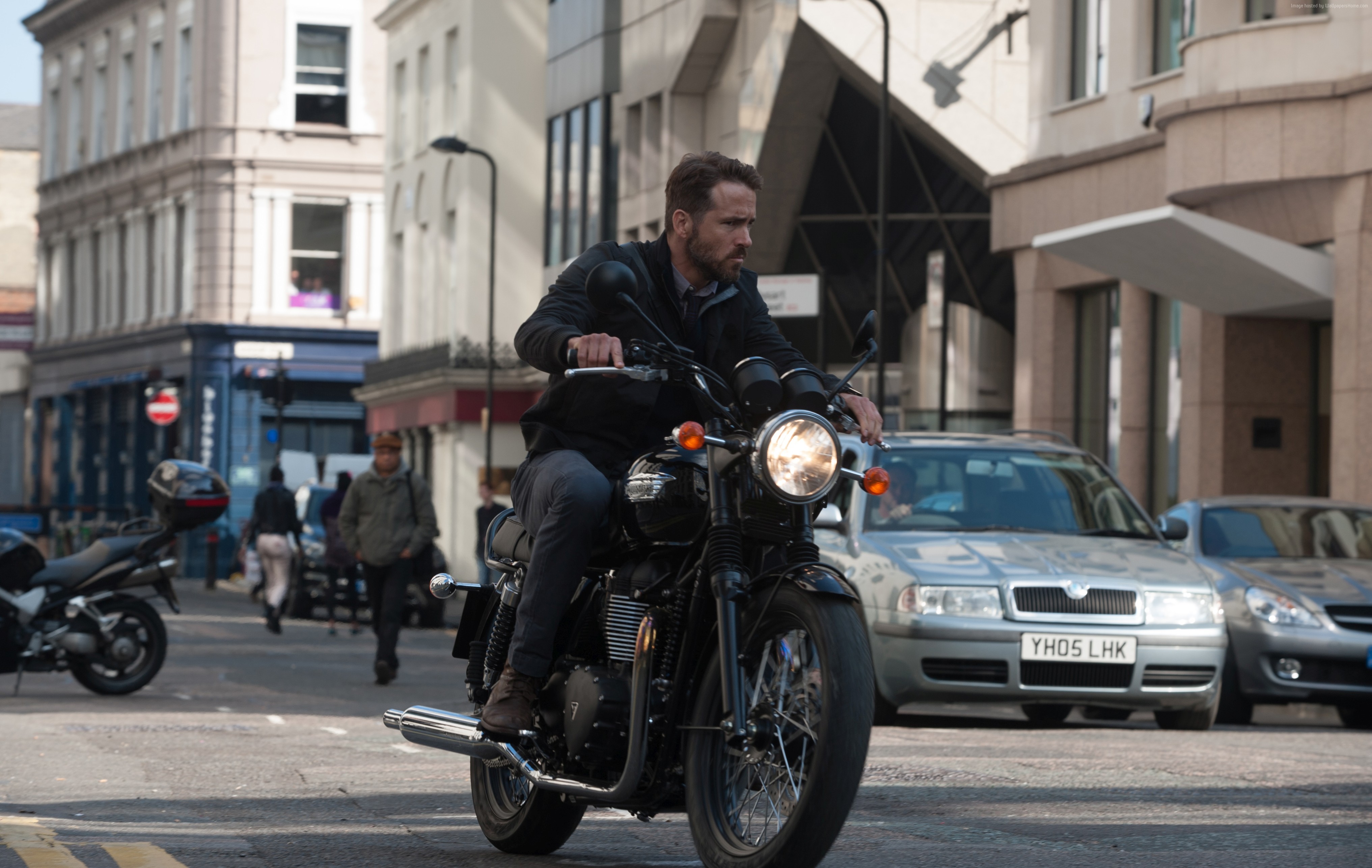 Ryan Reynolds on a motorcycle in London HD Wallpaper