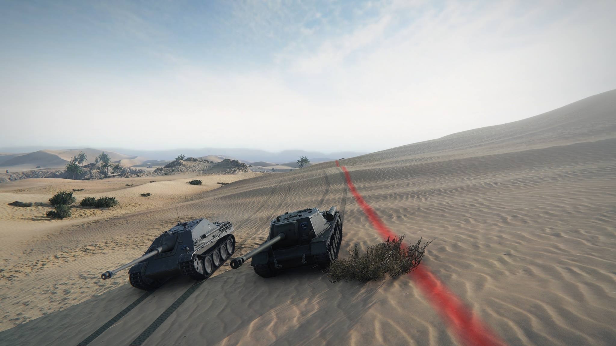 Two tanks in a desert landscape HD Wallpaper