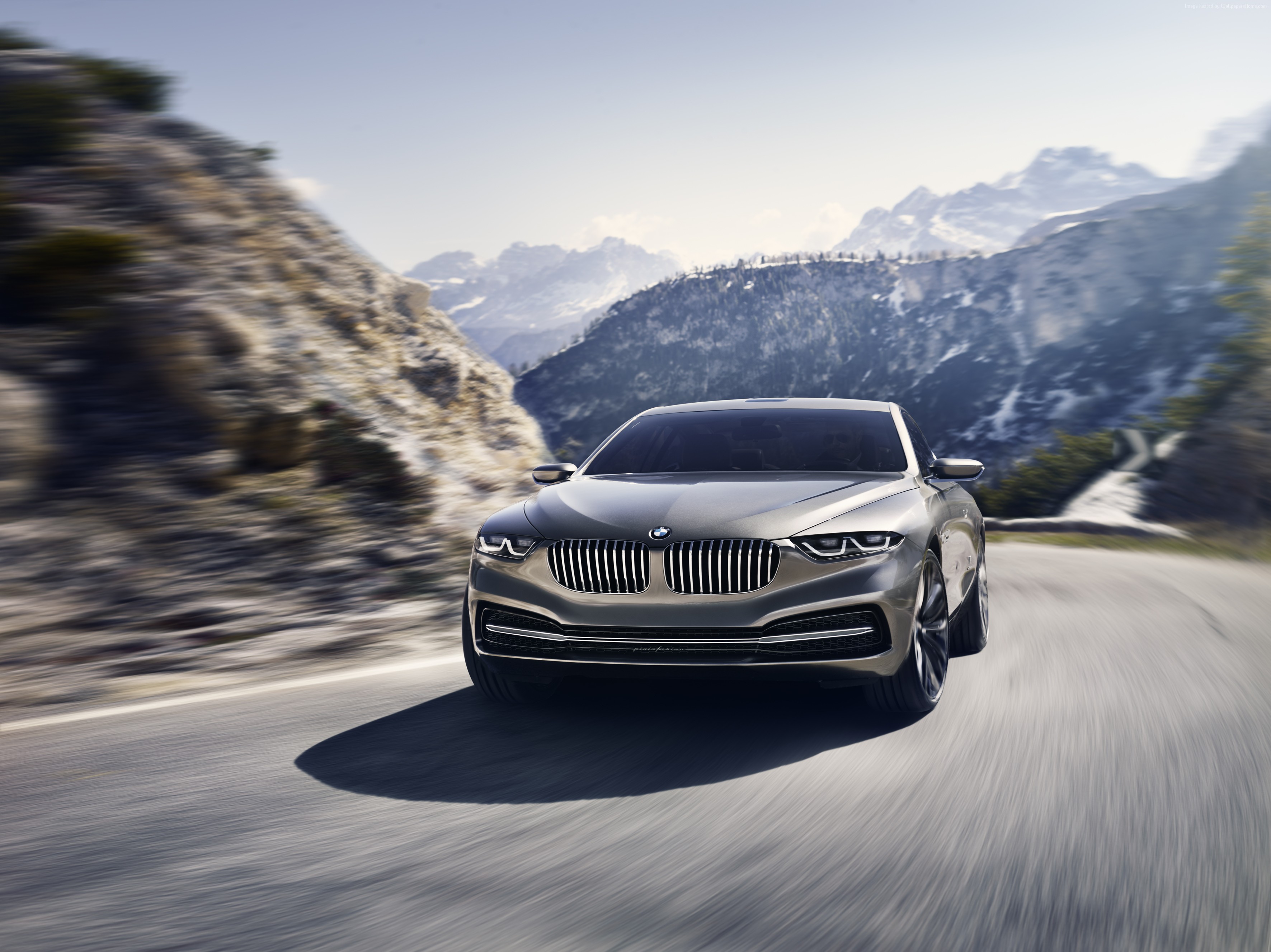 BMW Gran Lusso Coupe driving on a mountain road HD Wallpaper