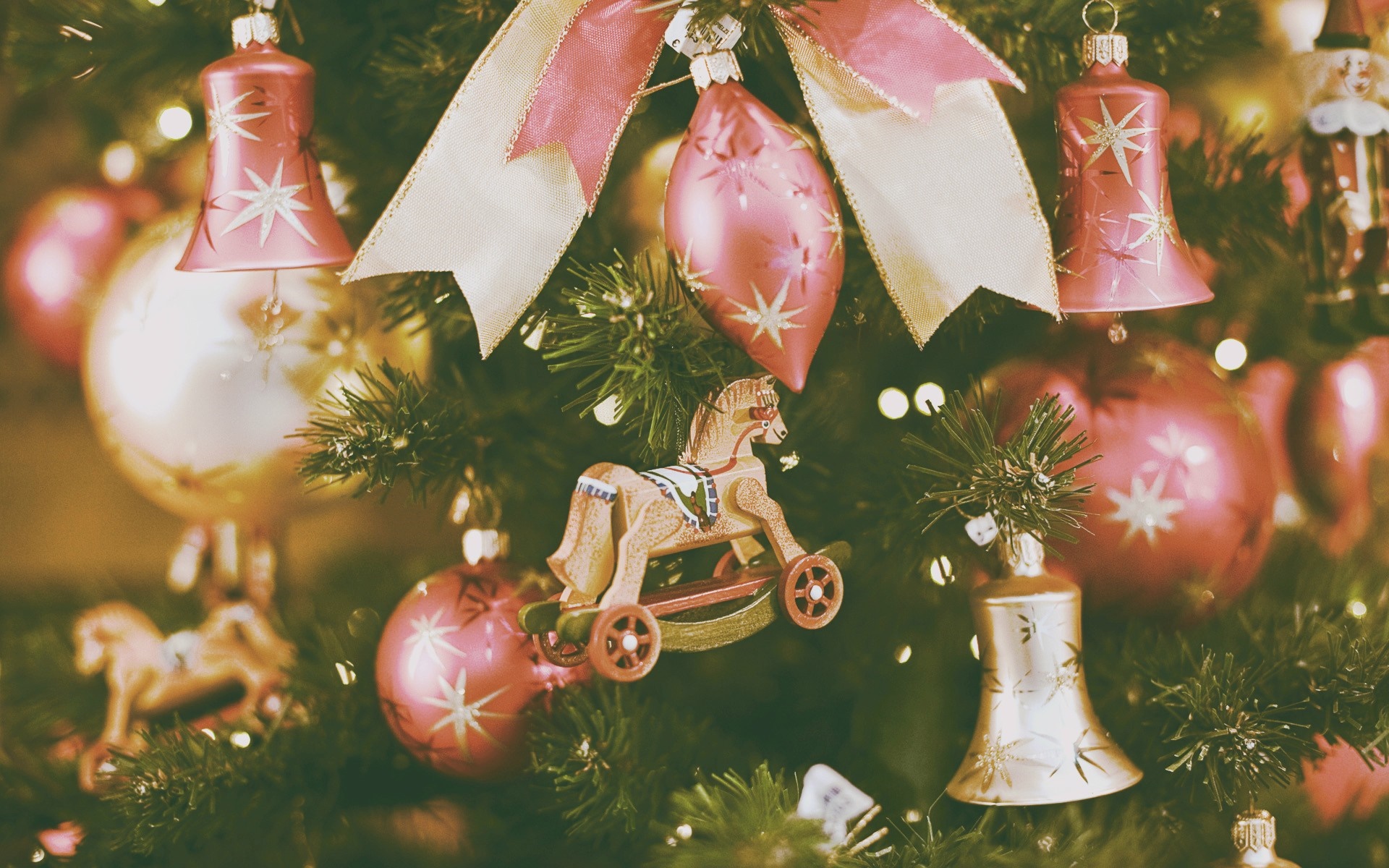 Christmas tree ornaments with bells and rocking horse HD Wallpaper