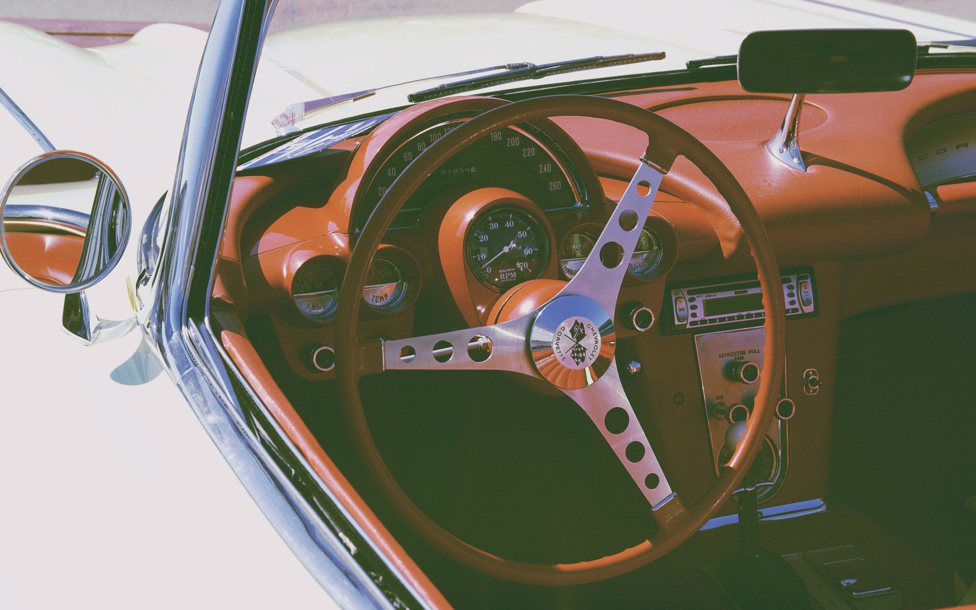 Interior of a vintage Chevrolet Corvette HD Wallpaper