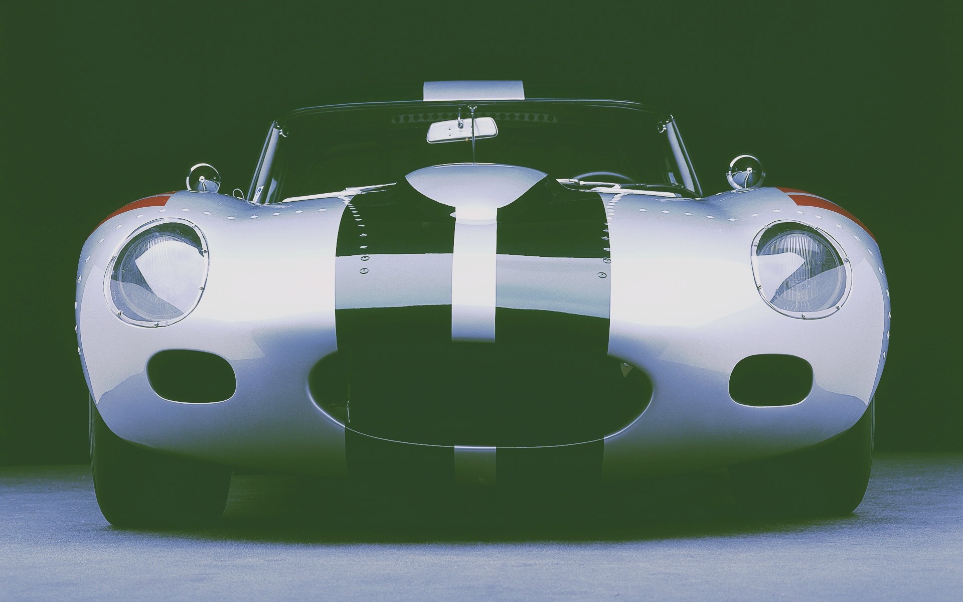 Silver Jaguar D-Type race car with racing stripes HD Wallpaper