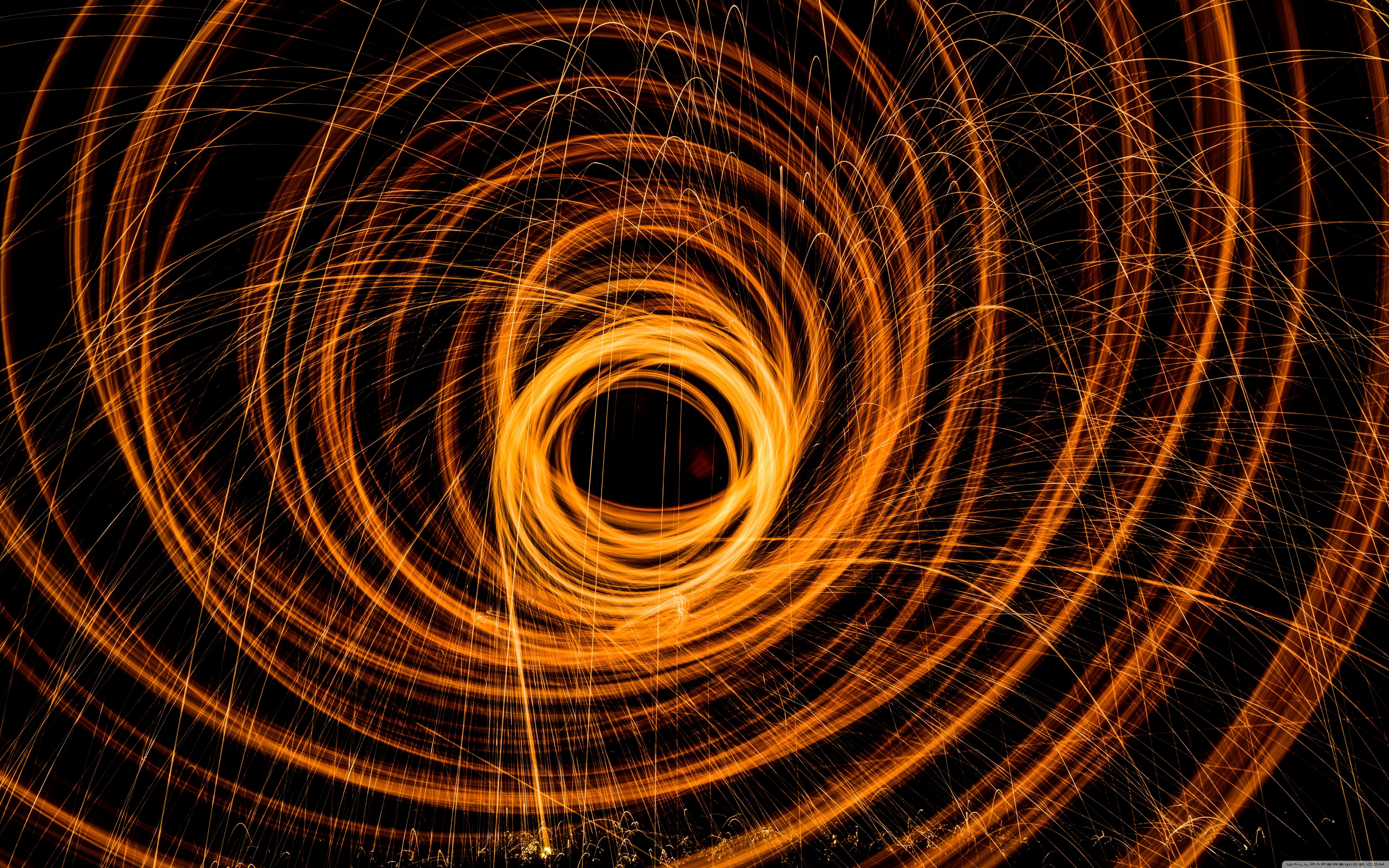 Long exposure light painting with spirals HD Wallpaper