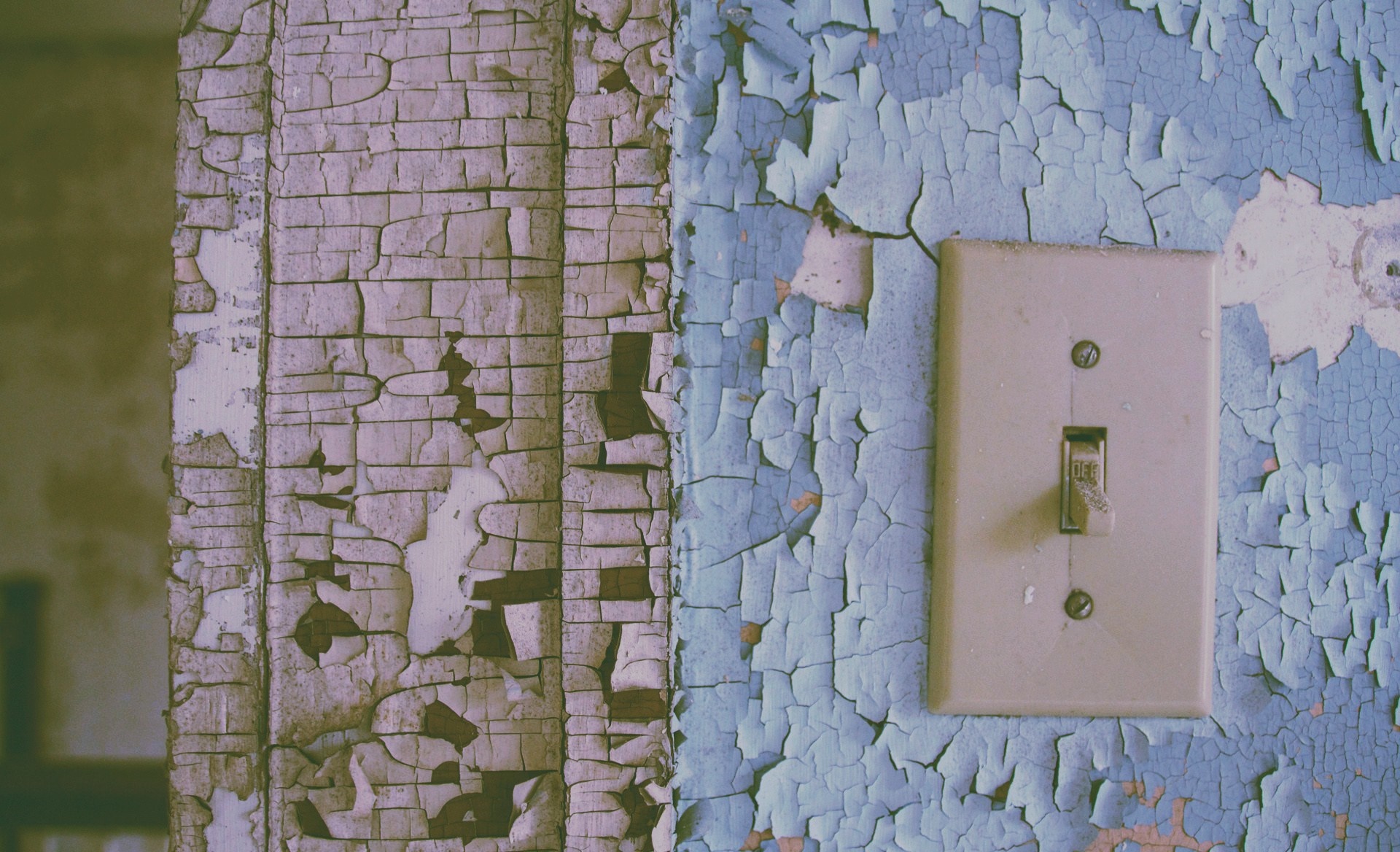 Peeling paint on wall with light switch HD Wallpaper