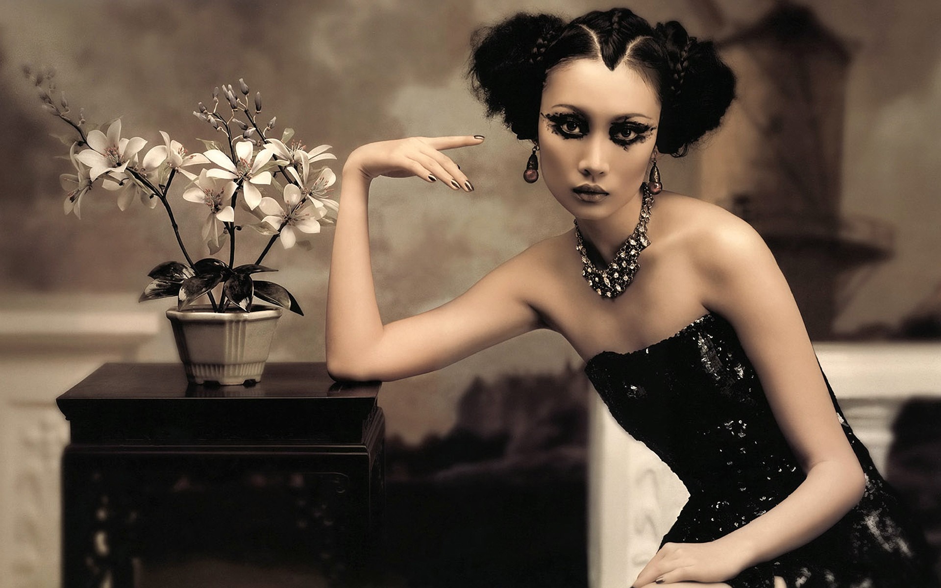 Asian woman in black dress with dramatic makeup and flowers HD Wallpaper
