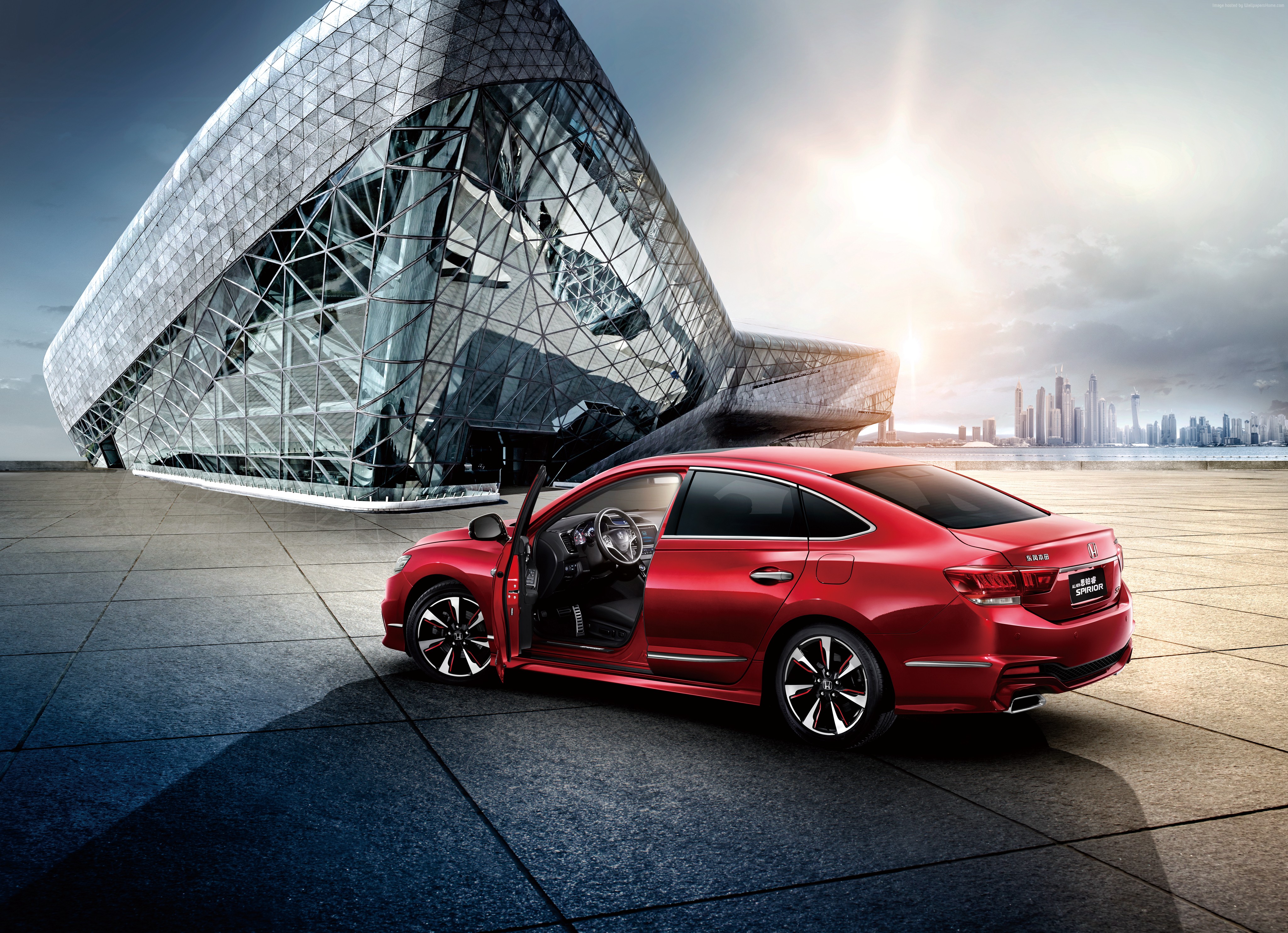 Red Honda Spirior Si sedan parked by modern building HD Wallpaper