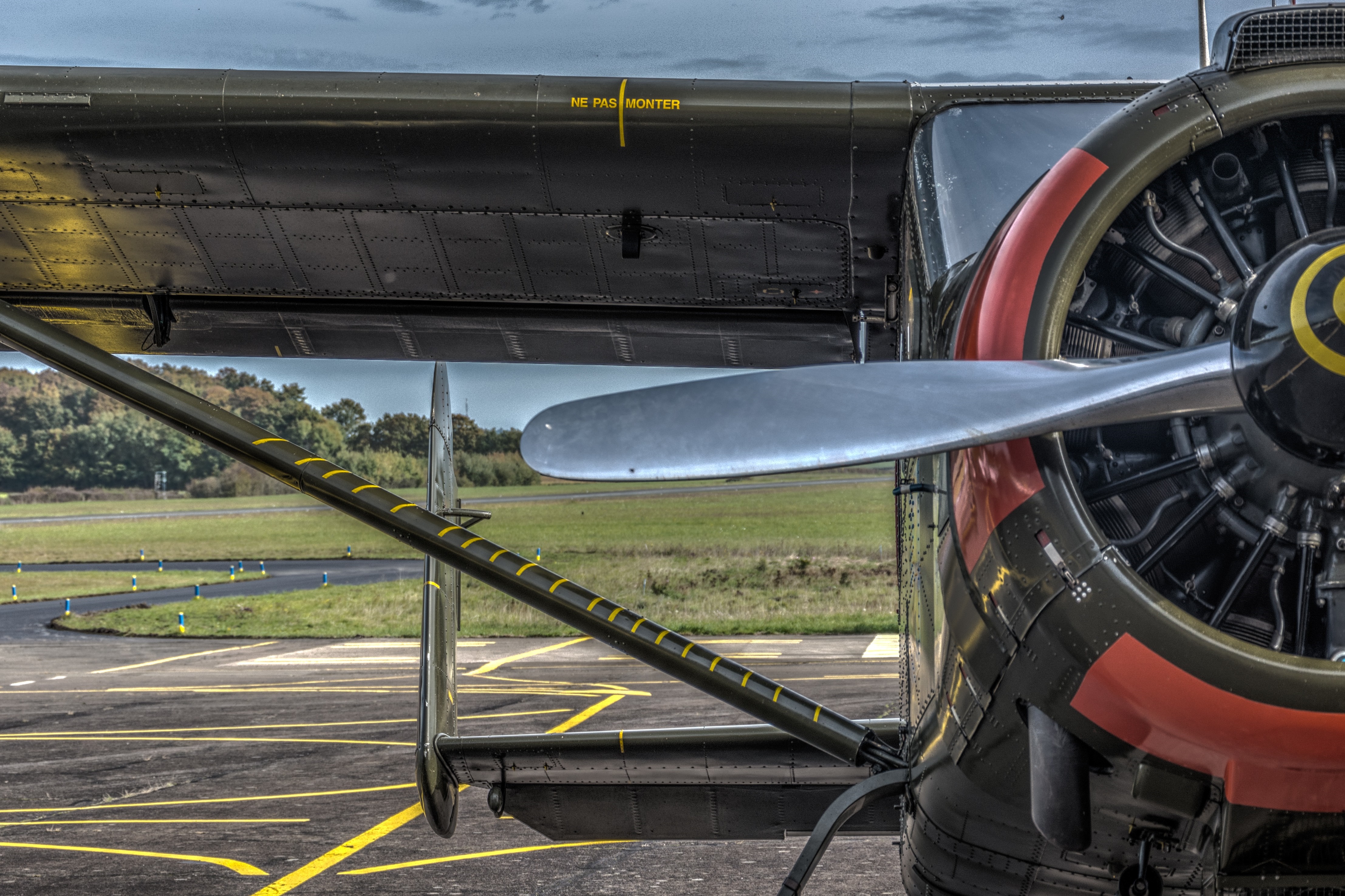 Close-up of an old airplane engine and wing HD Wallpaper