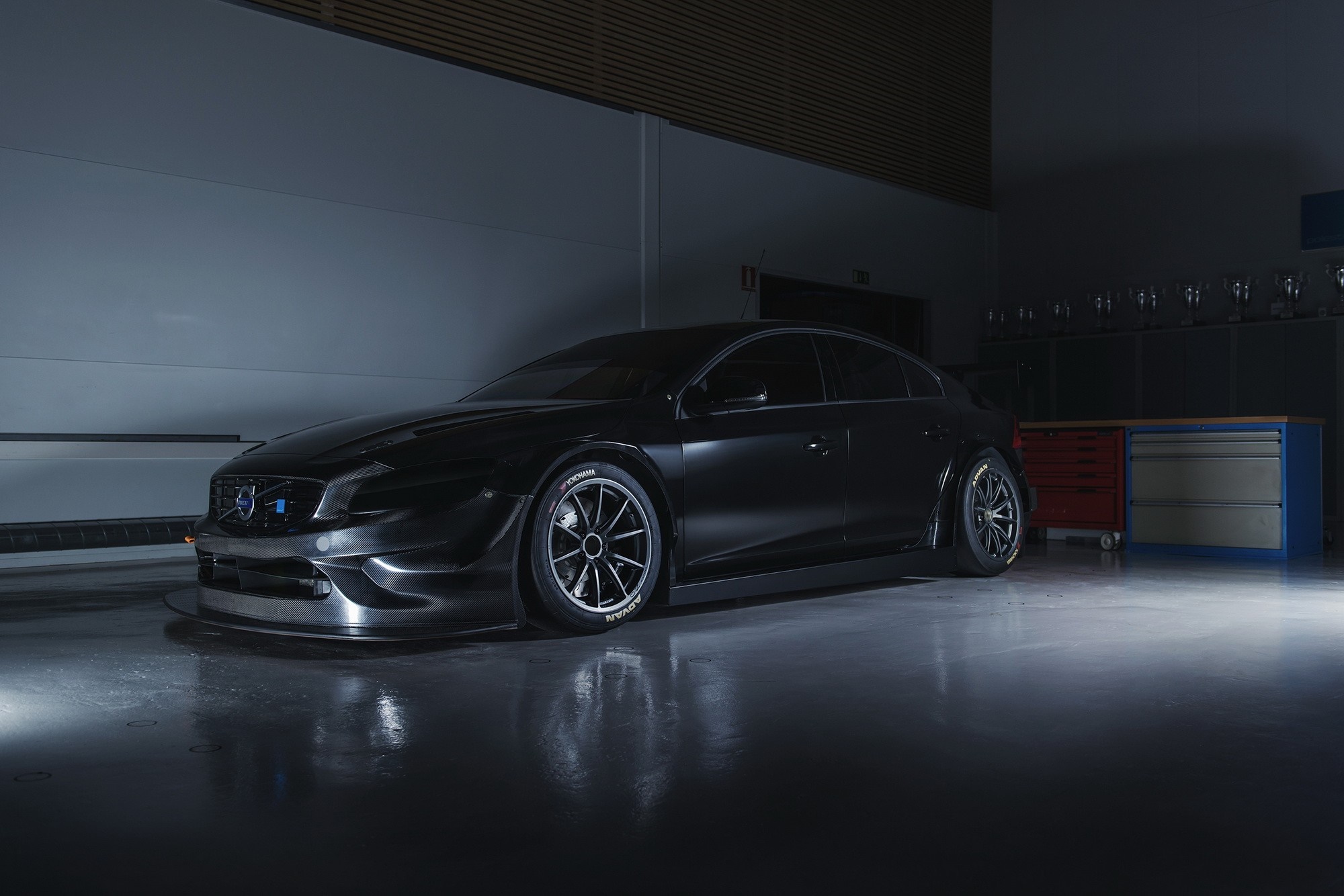 Black Volvo S60 WTCC race car in a garage HD Wallpaper