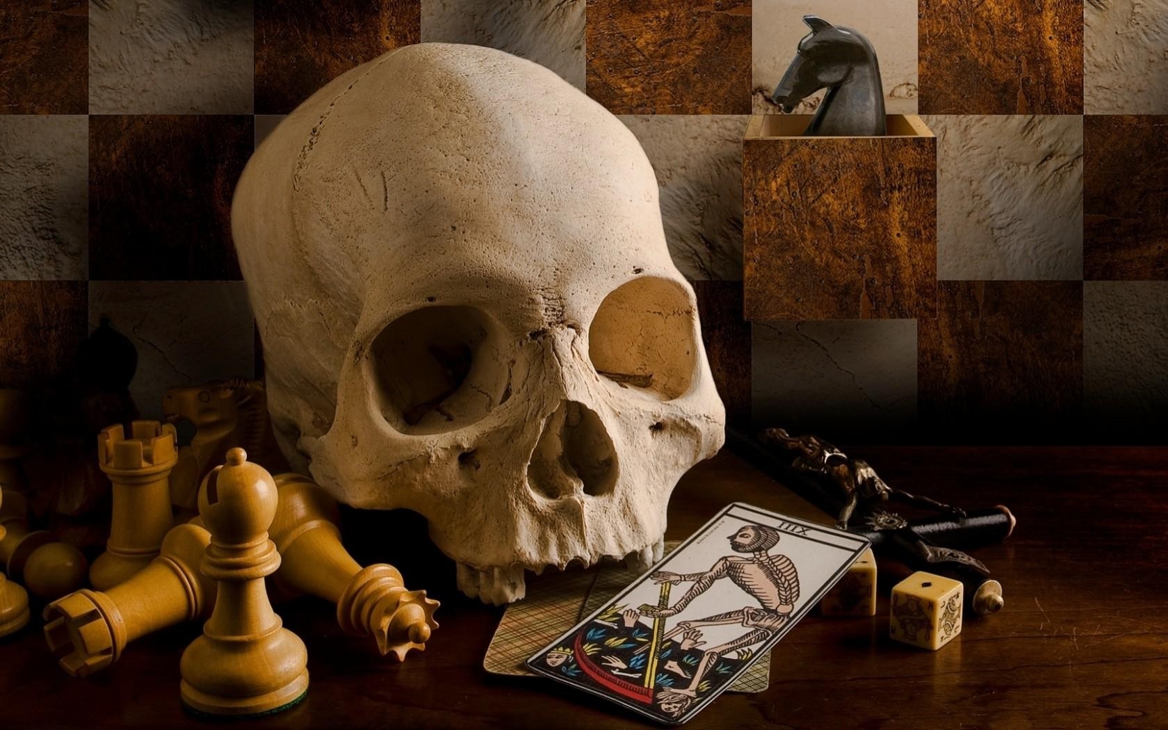 Still life with skull, chess pieces, tarot card, and dice HD Wallpaper