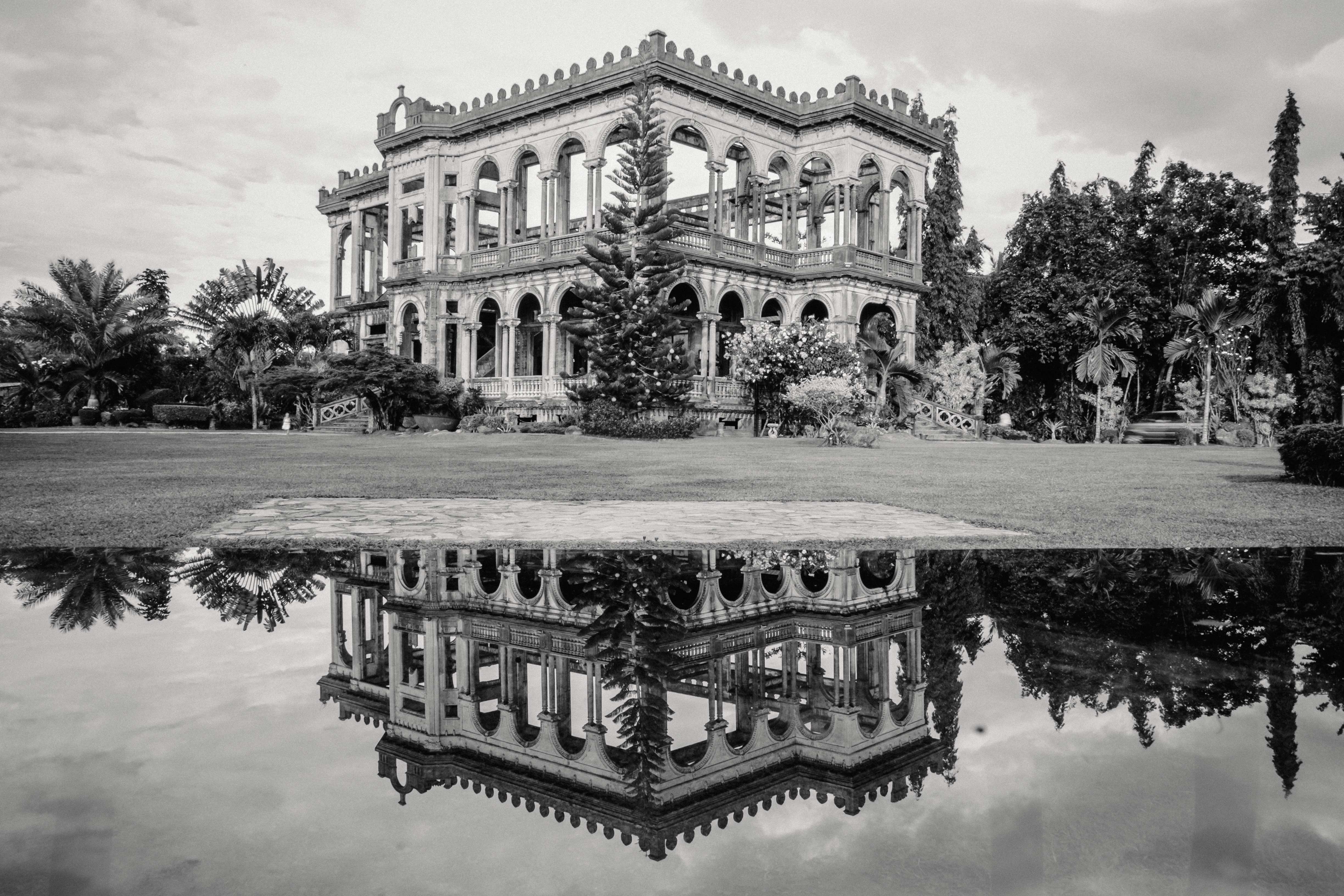 Ruined mansion with reflection in water, Philippines HD Wallpaper