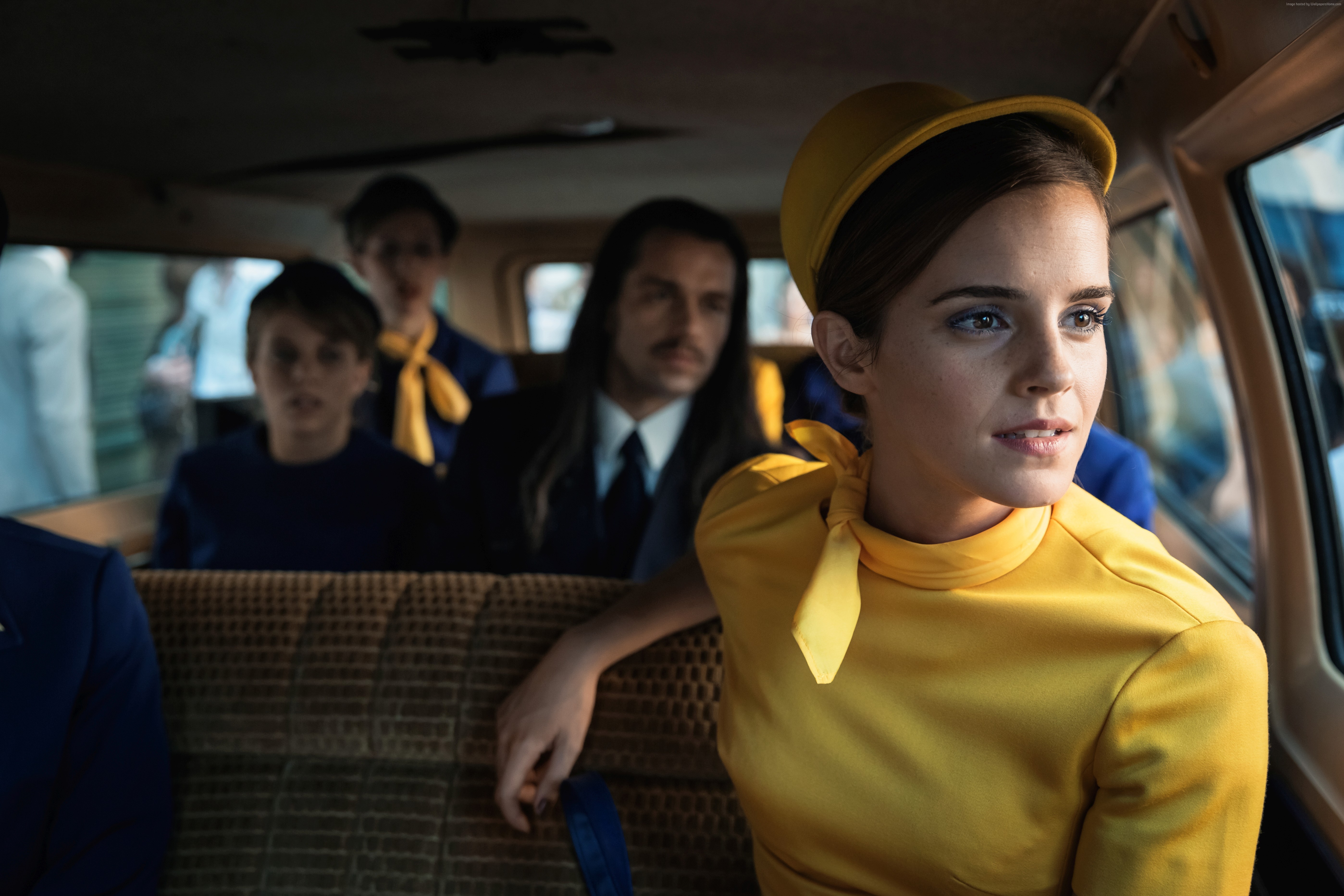 Emma Watson in a yellow outfit in a car HD Wallpaper