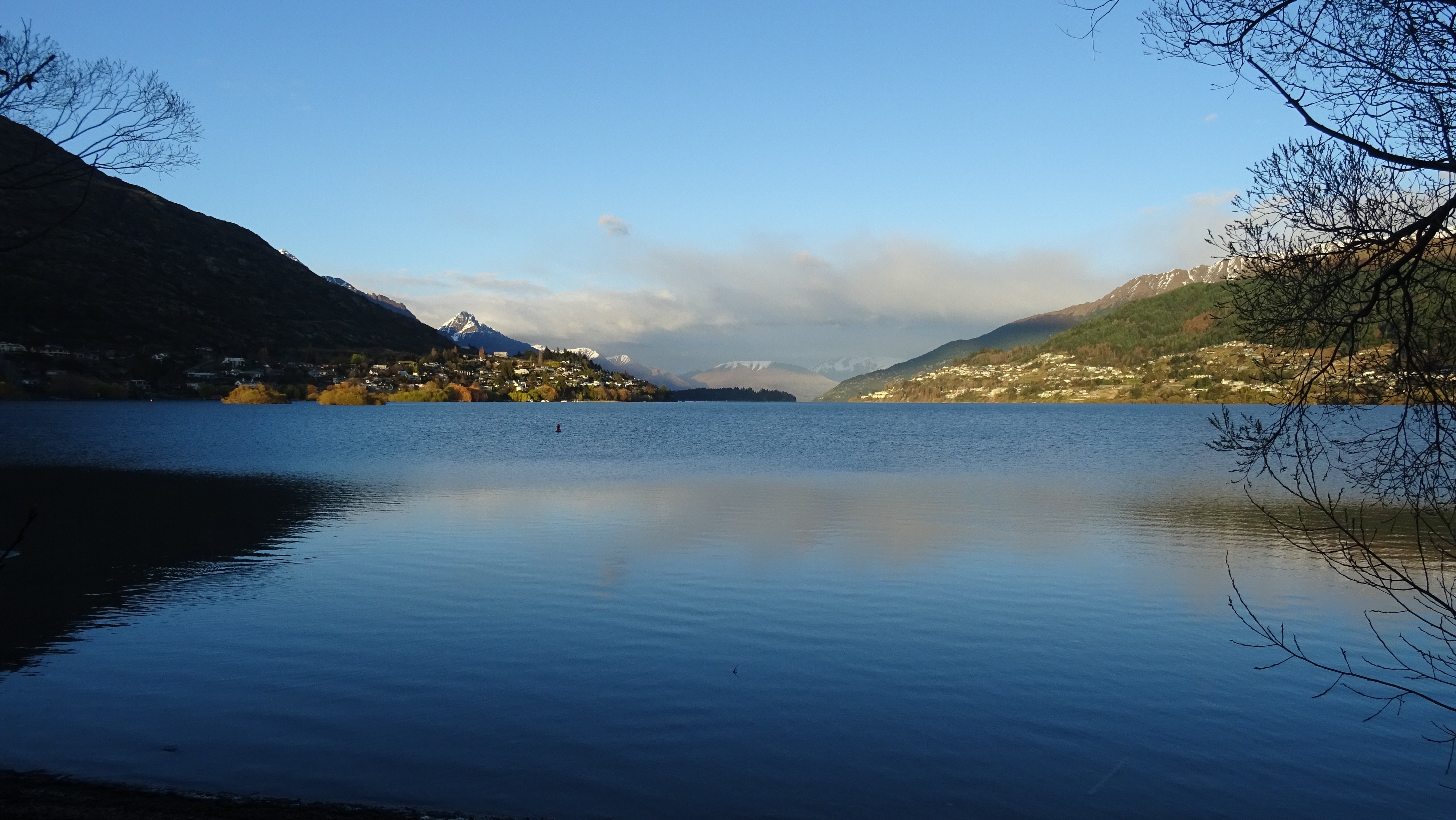 Lake Wakatipu with mountains and town in Queenstown, New Zealand HD Wallpaper