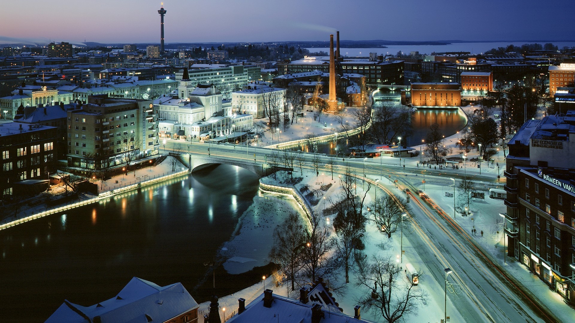 Winter cityscape with river and bridge at dusk HD Wallpaper