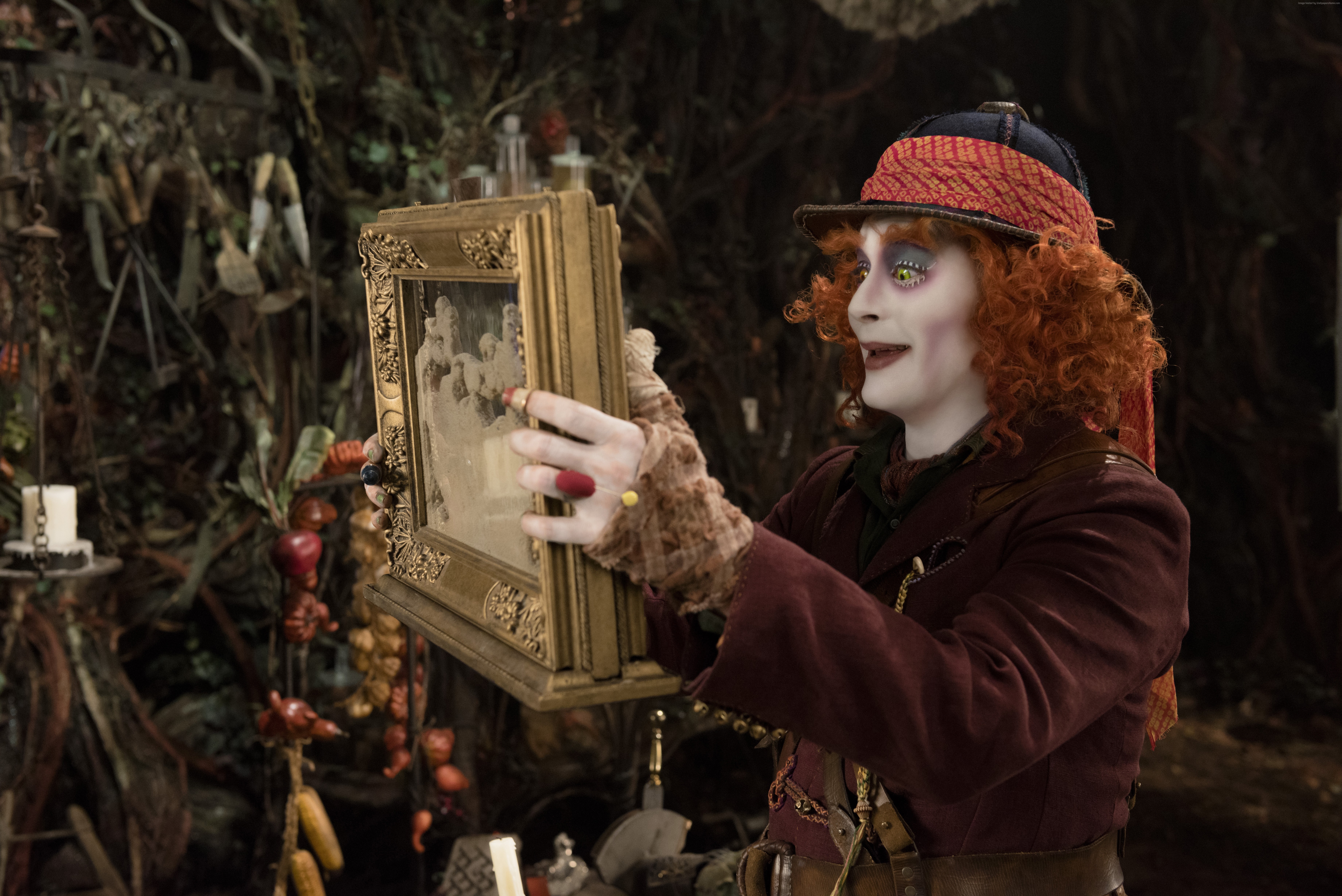 The Mad Hatter from Alice Through the Looking Glass holding a framed photo HD Wallpaper
