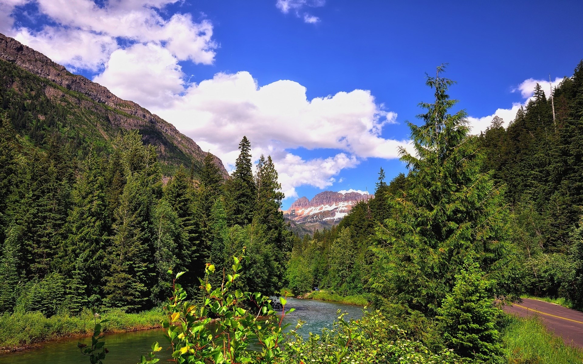 Mountain river and forest road under blue sky HD Wallpaper