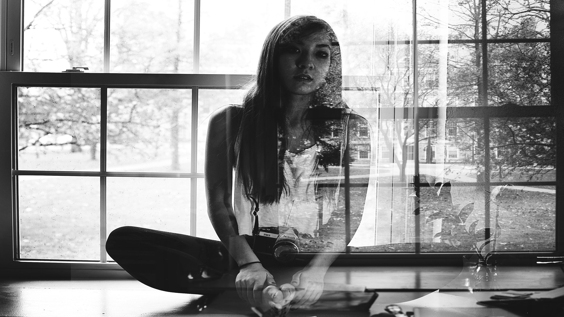 Double exposure of a woman sitting by a window HD Wallpaper