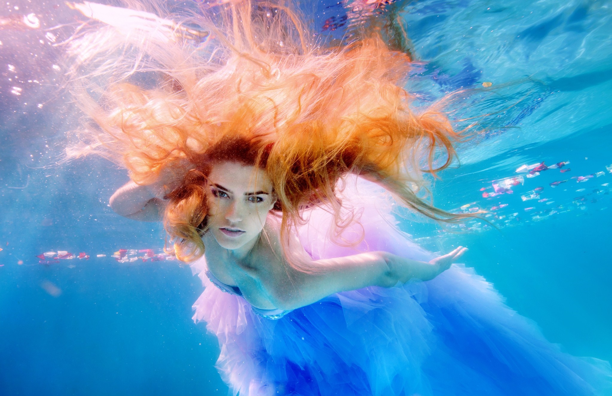 Redhead woman in blue and pink dress underwater HD Wallpaper