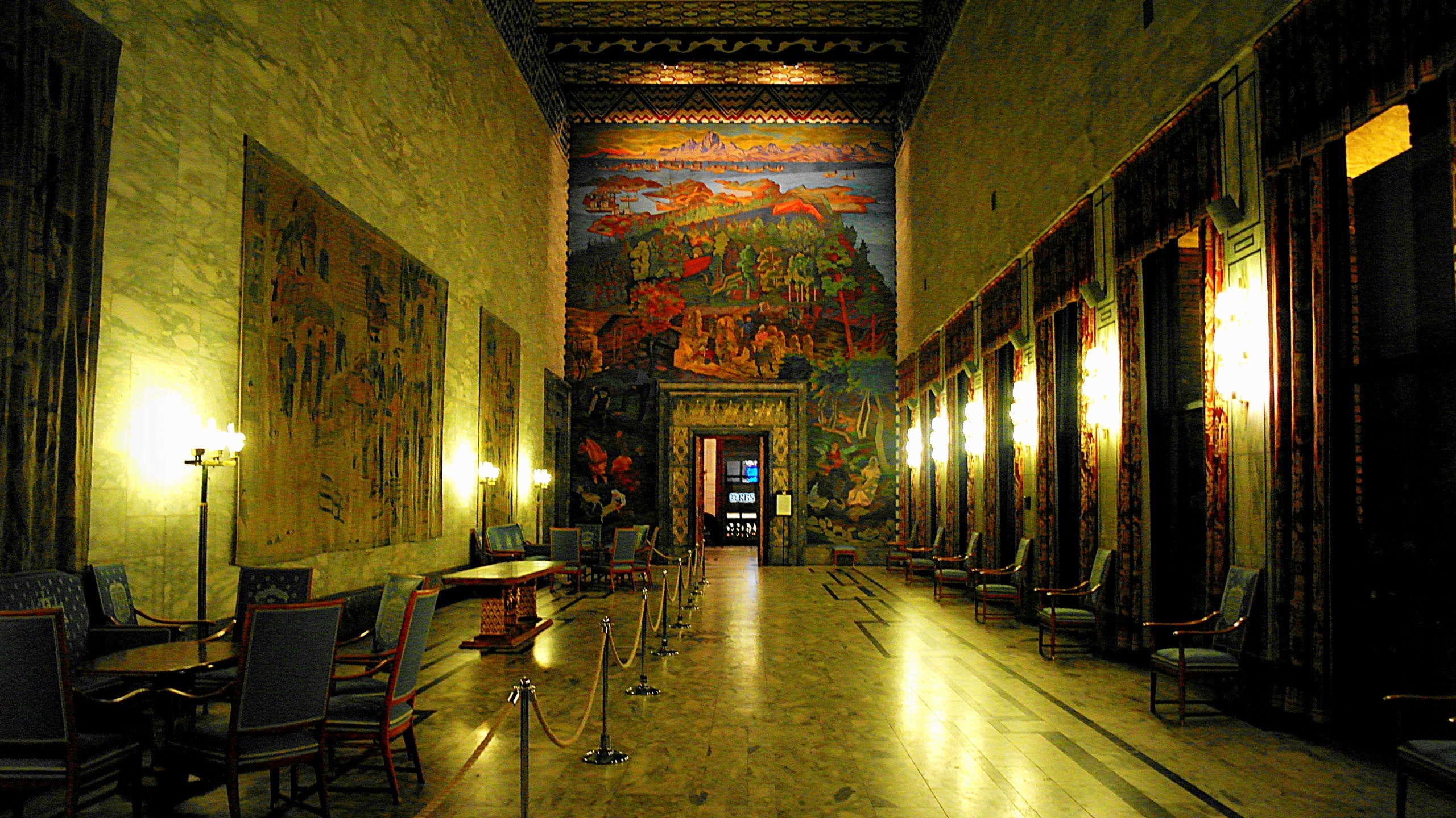 Interior of Oslo City Hall with large murals and tapestries HD Wallpaper
