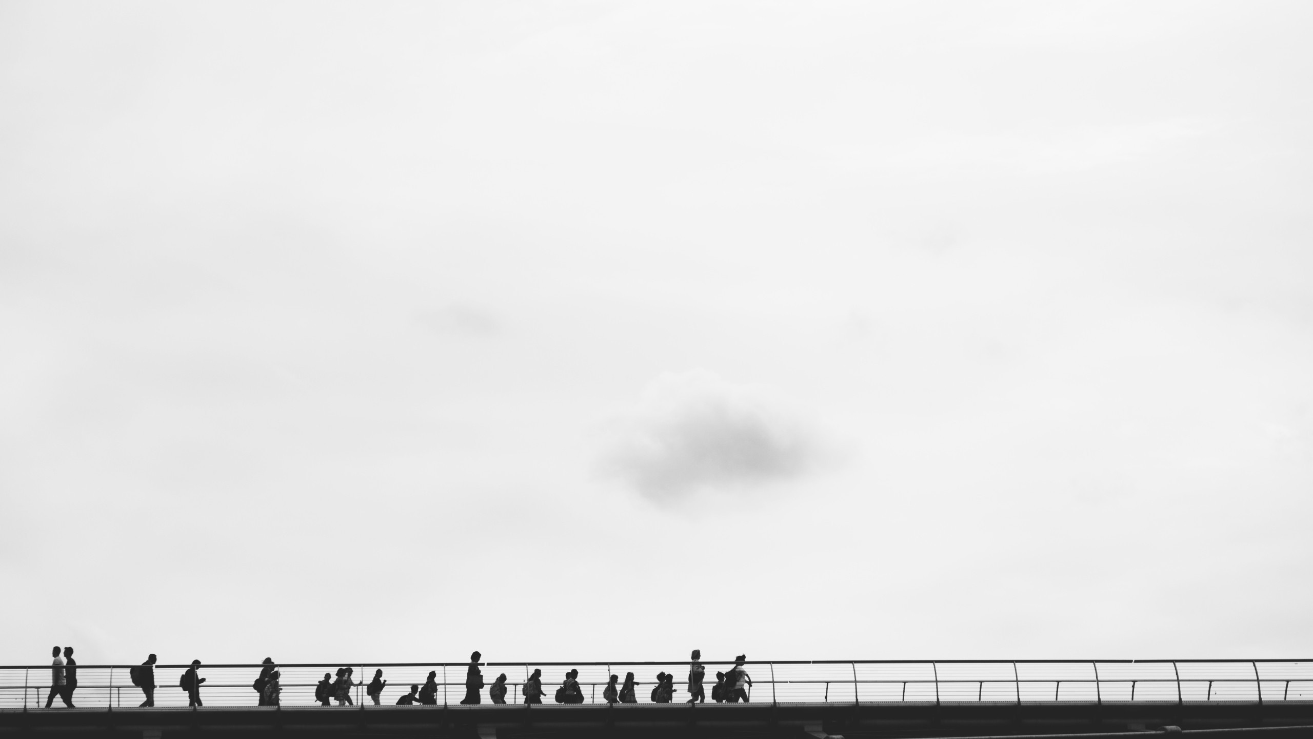 People walking on a bridge in monochrome HD Wallpaper