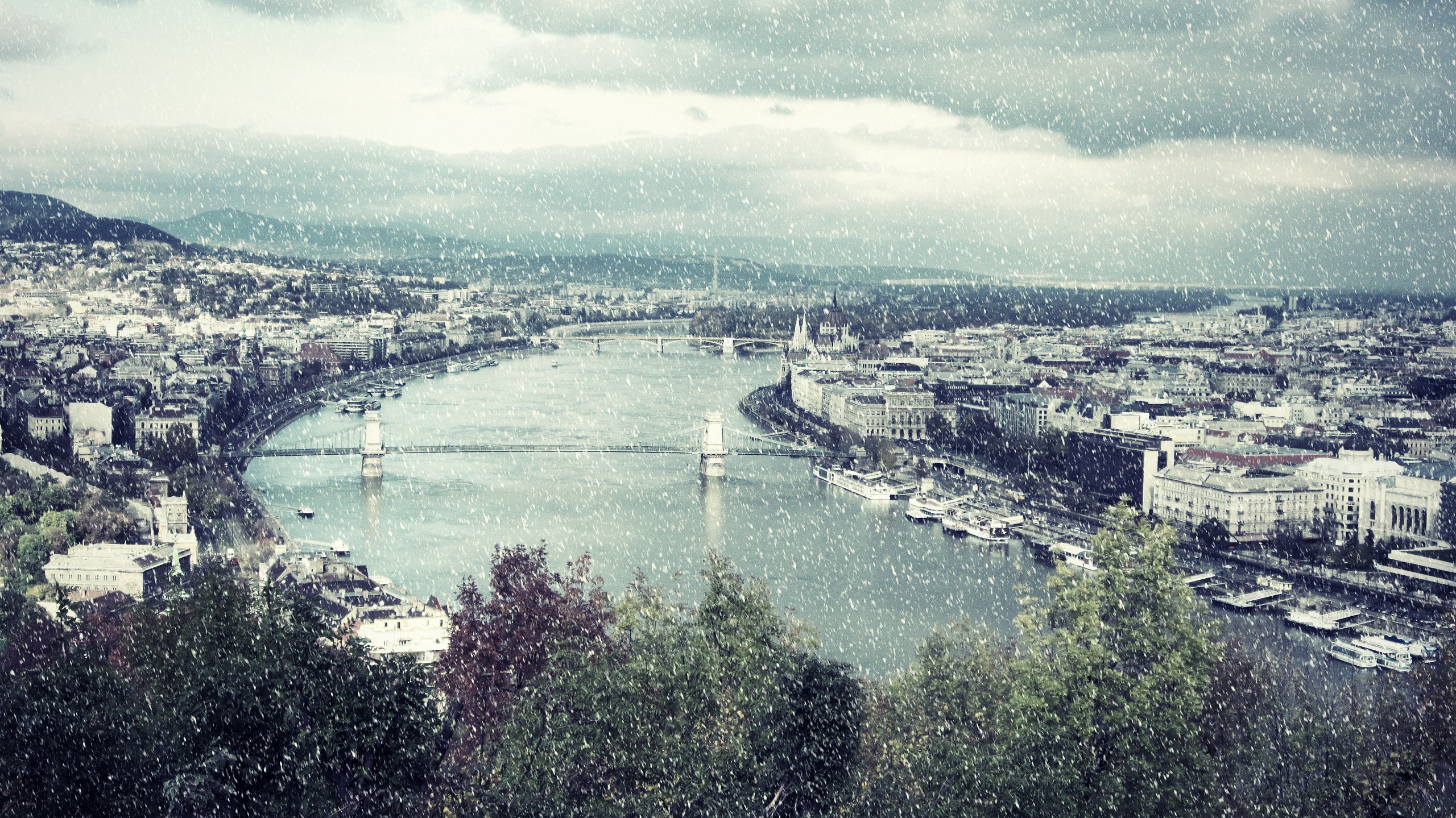 Budapest cityscape with Danube River and bridges in snow HD Wallpaper