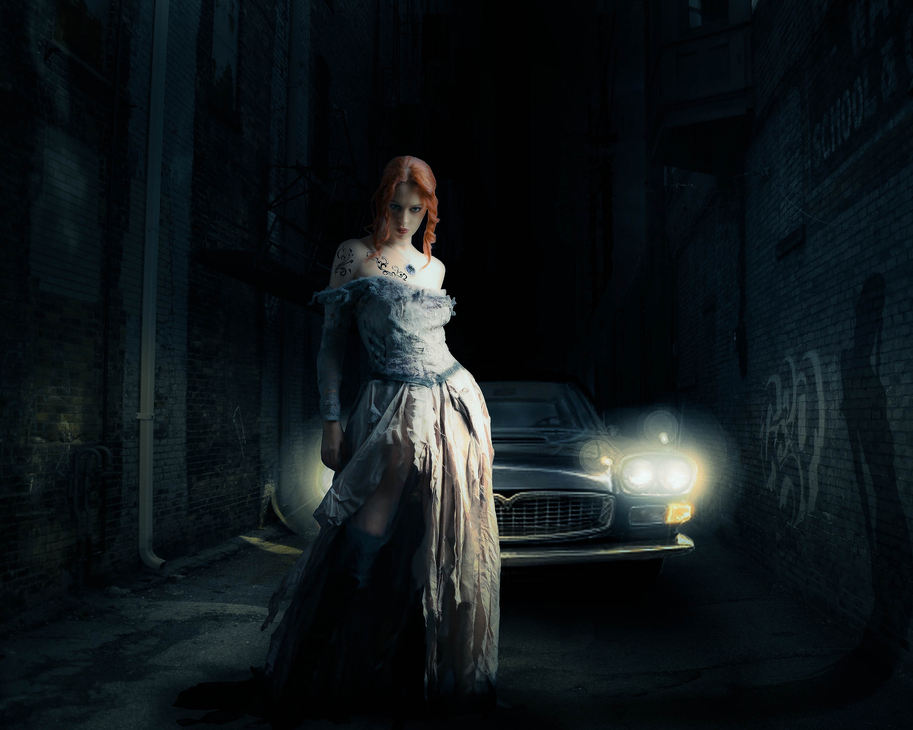 Woman in a tattered dress in a dark alley with a car HD Wallpaper
