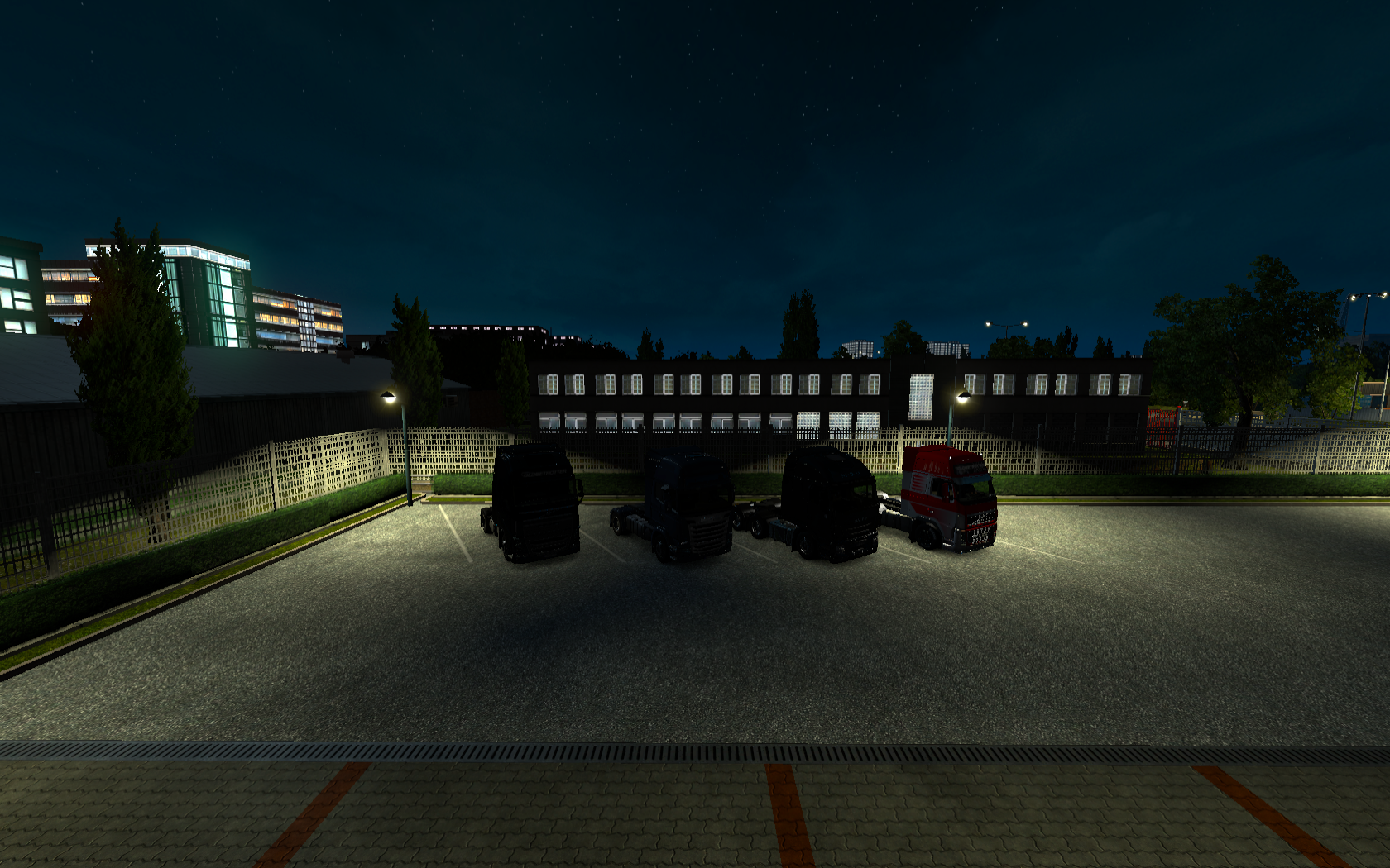 Euro Truck Simulator 2: Trucks parked at night HD Wallpaper