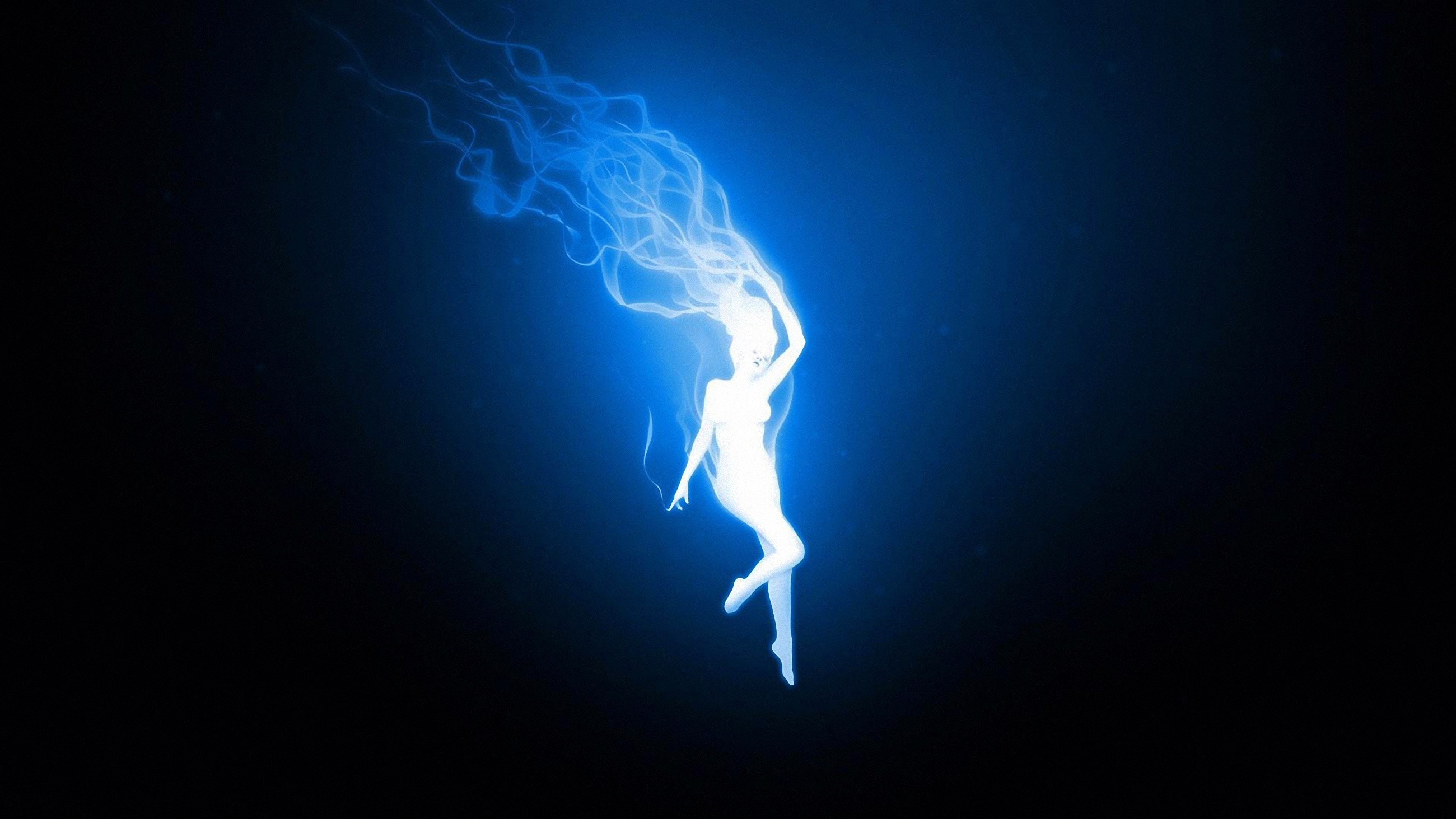 Woman with blue energy hair in darkness HD Wallpaper