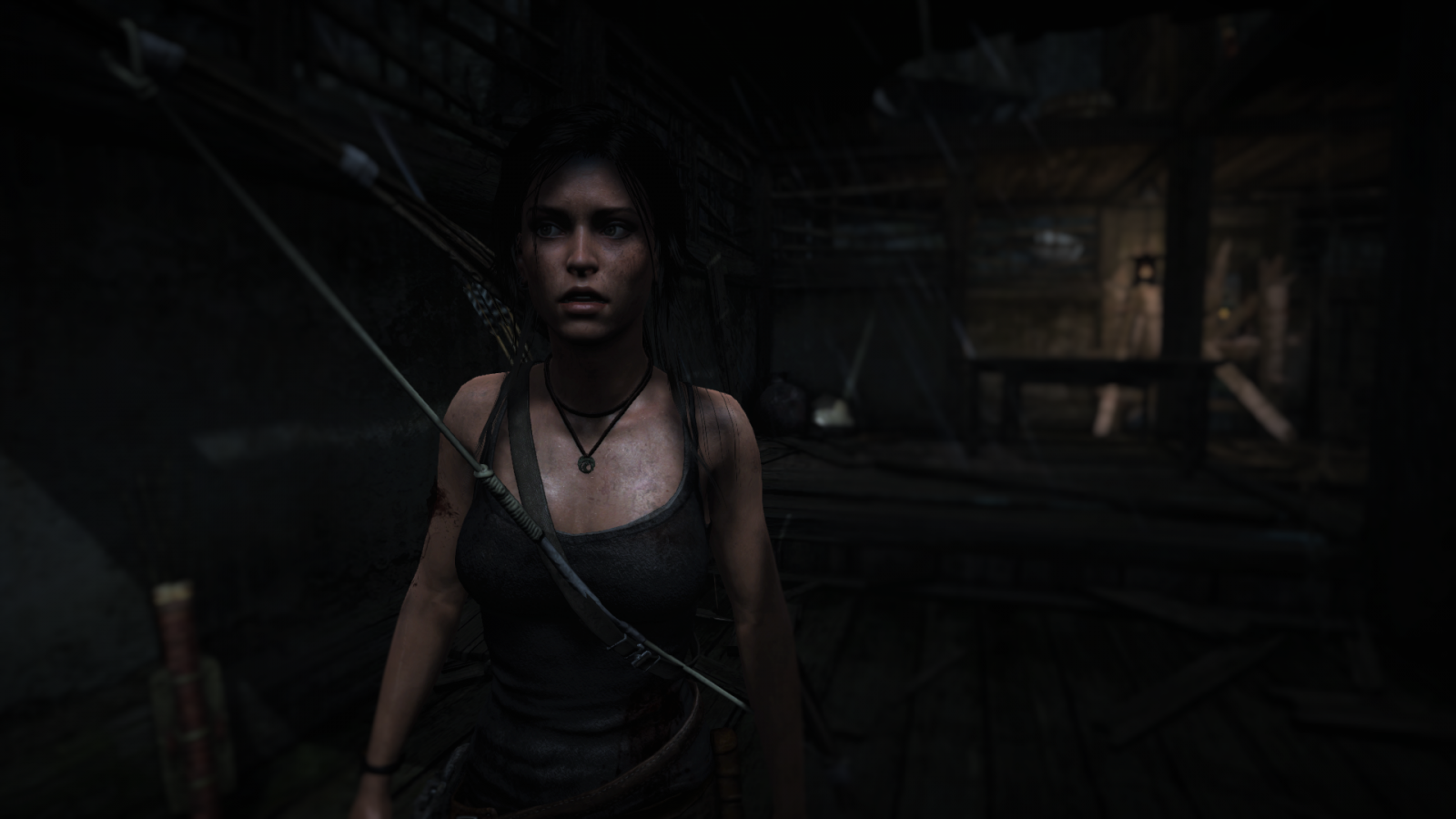 Lara Croft from Tomb Raider in a dark environment HD Wallpaper