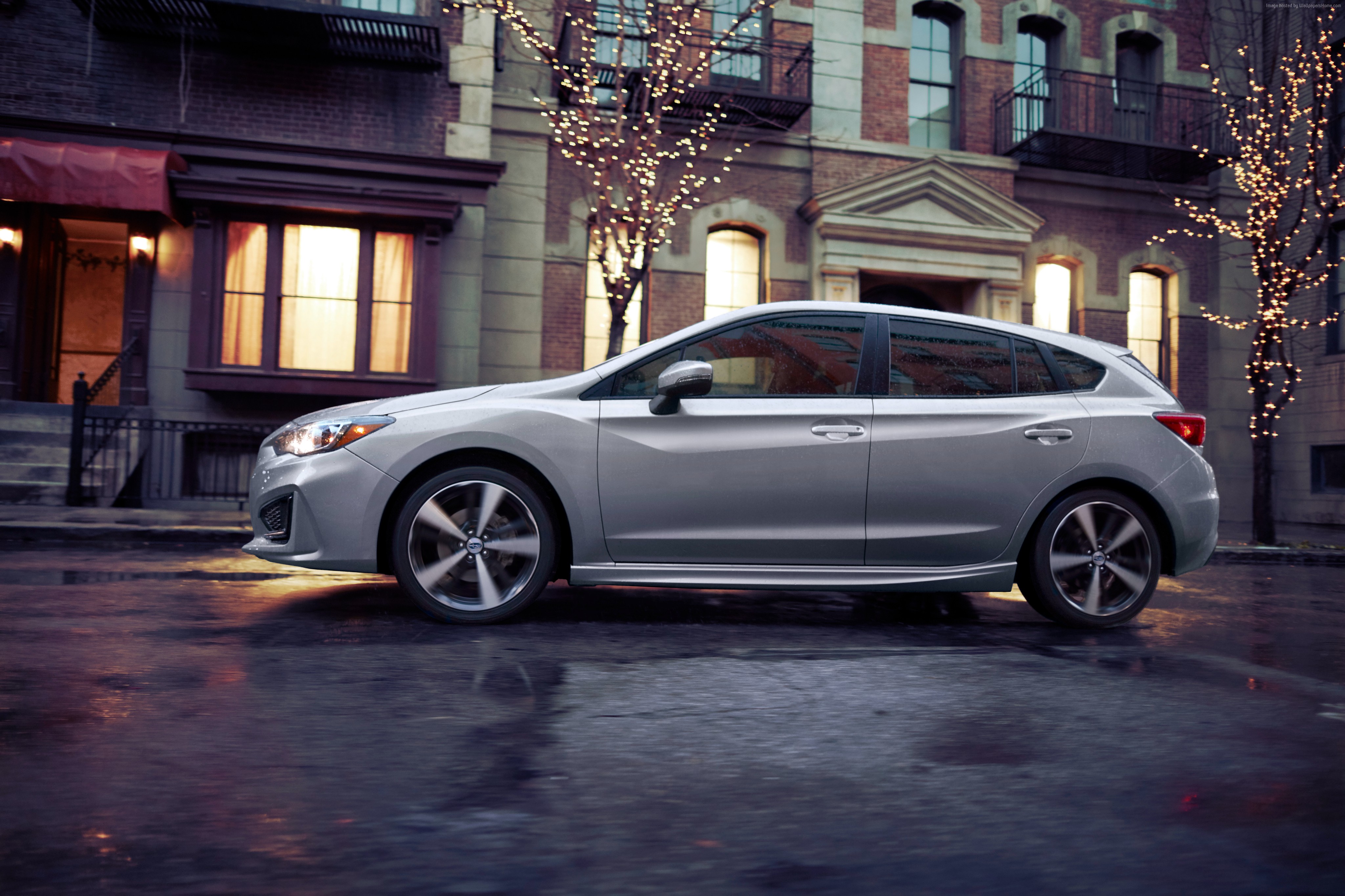 Silver Subaru Impreza 5-door sport parked on a wet street HD Wallpaper