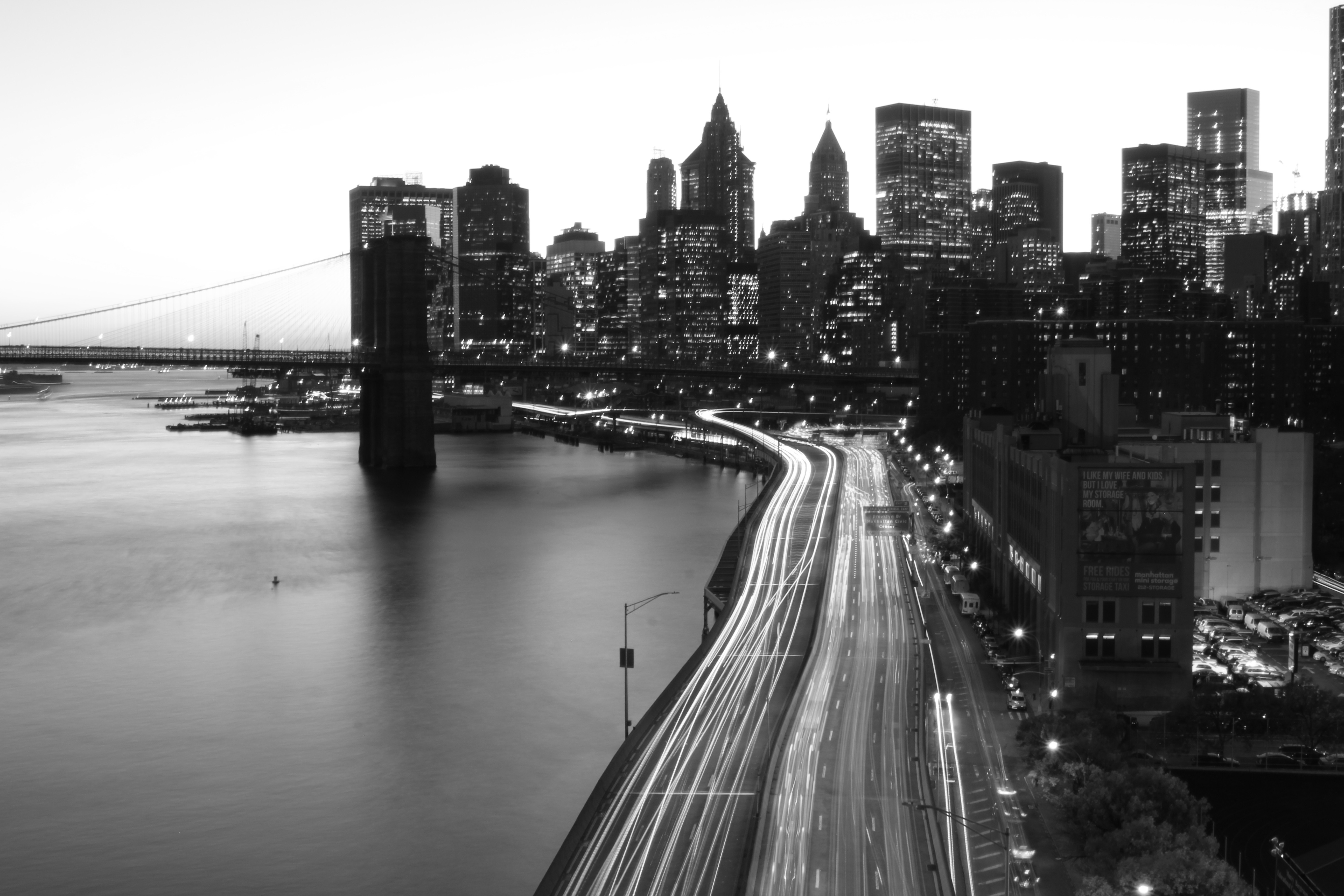 New York City skyline and Brooklyn Bridge at dusk HD Wallpaper