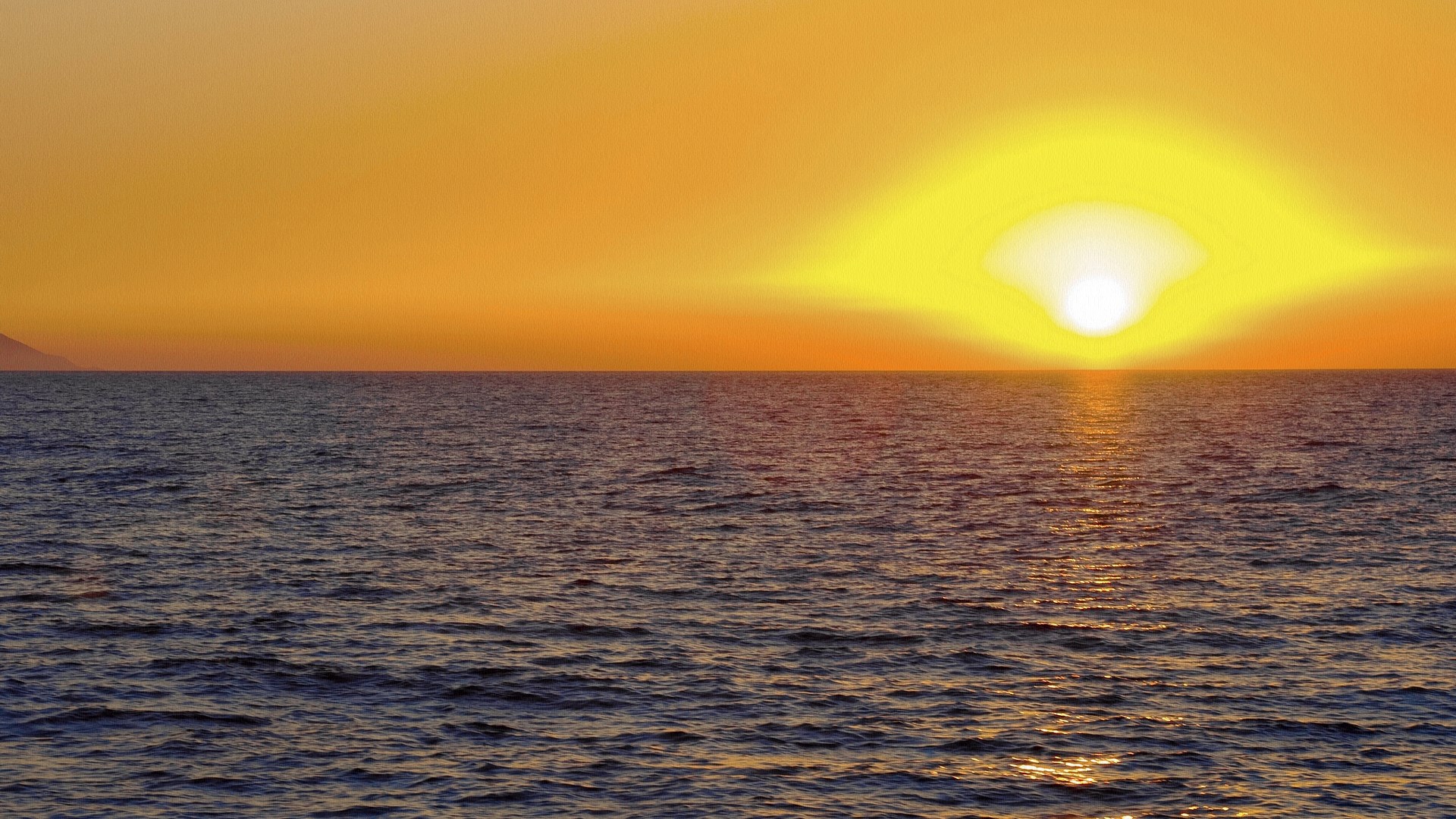 Sunset over the ocean with a distant island HD Wallpaper