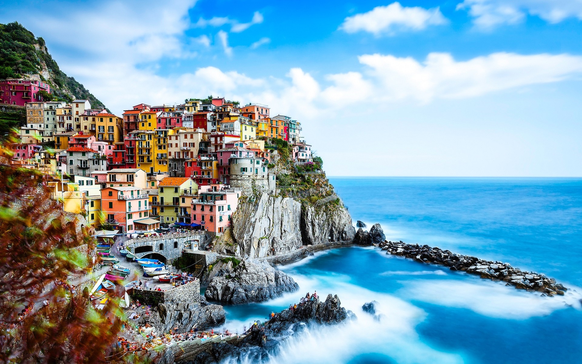 Colorful village on a cliff overlooking the sea HD Wallpaper