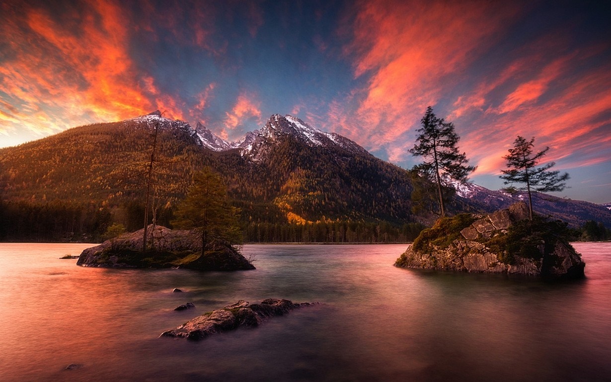 Sunset over mountains and lake with islands HD Wallpaper